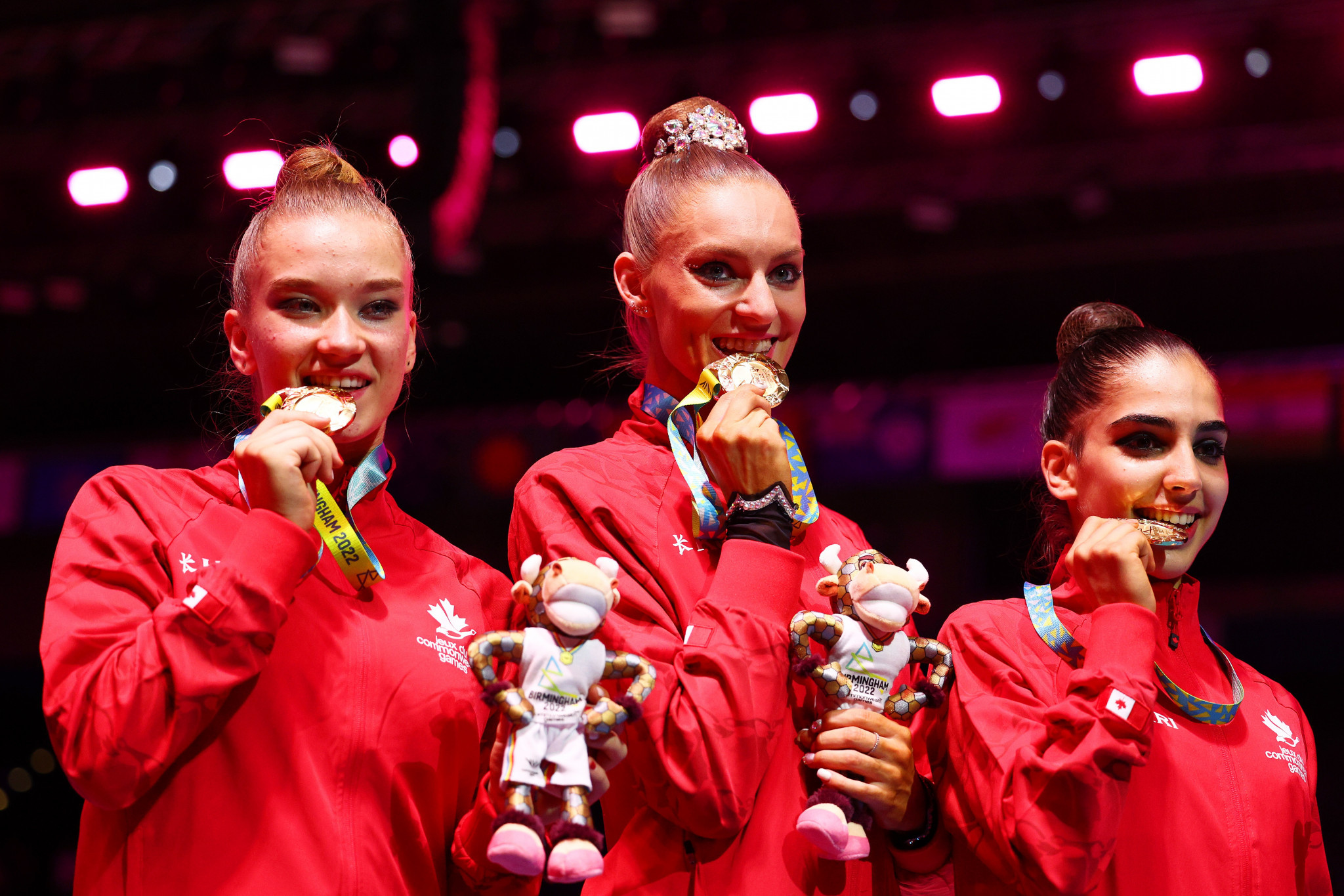 Tatiana Cocsanova, Carmel Kallemaa and Suzanna Shahbazian won rhythmic gymnastics team gold for Canada ©Getty Images