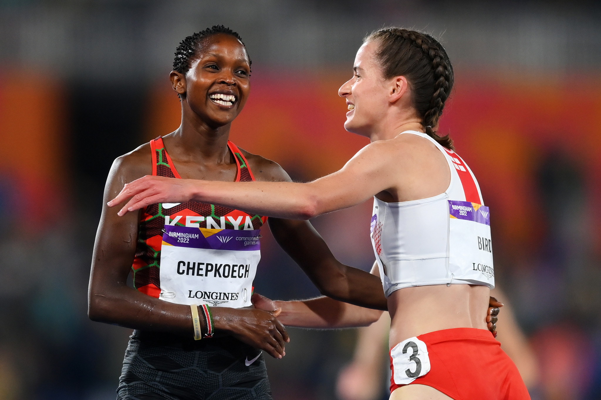 Women's 3,000m steeplechase winner Jackline Chepkoech of Kenya congratulating silver medallist Lizzie Bird of England ©Getty Images