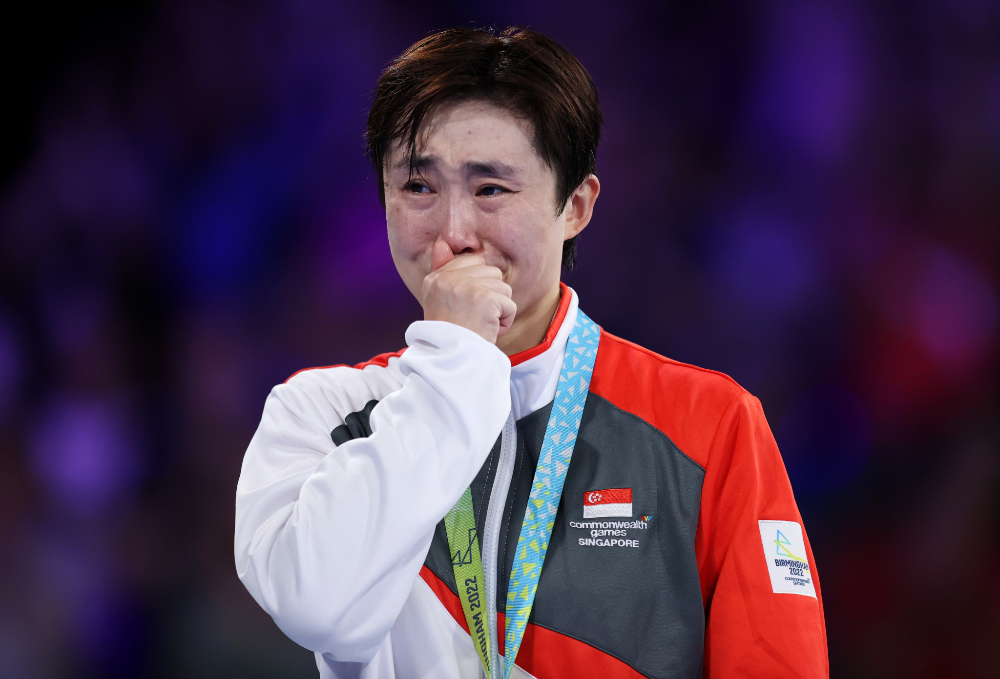 Feng Tianwei was emotional on the podium after receiving her gold medal ©Getty Images