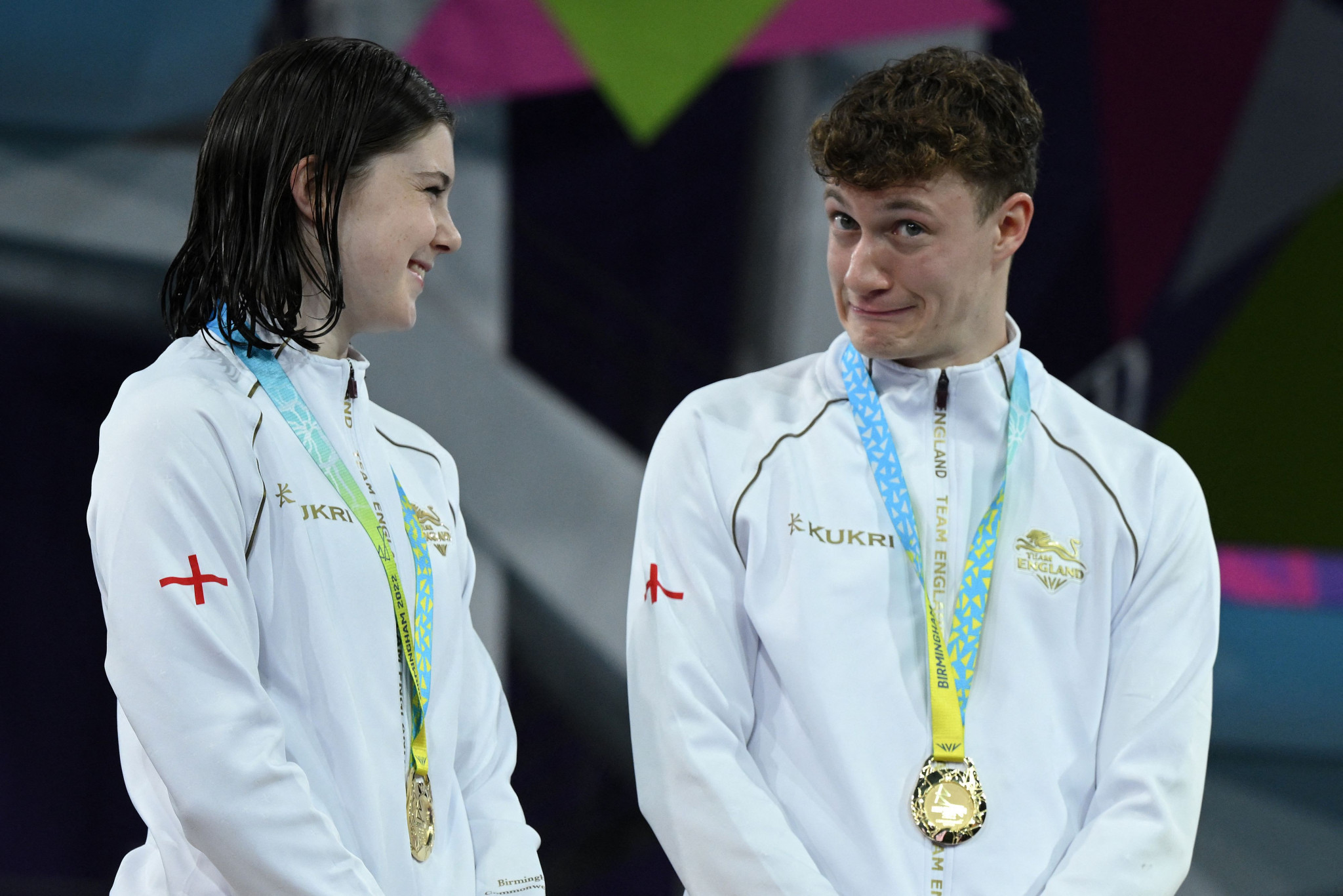 England's mixed diving team secured a gold and were all smiles on the podium too ©Getty Images