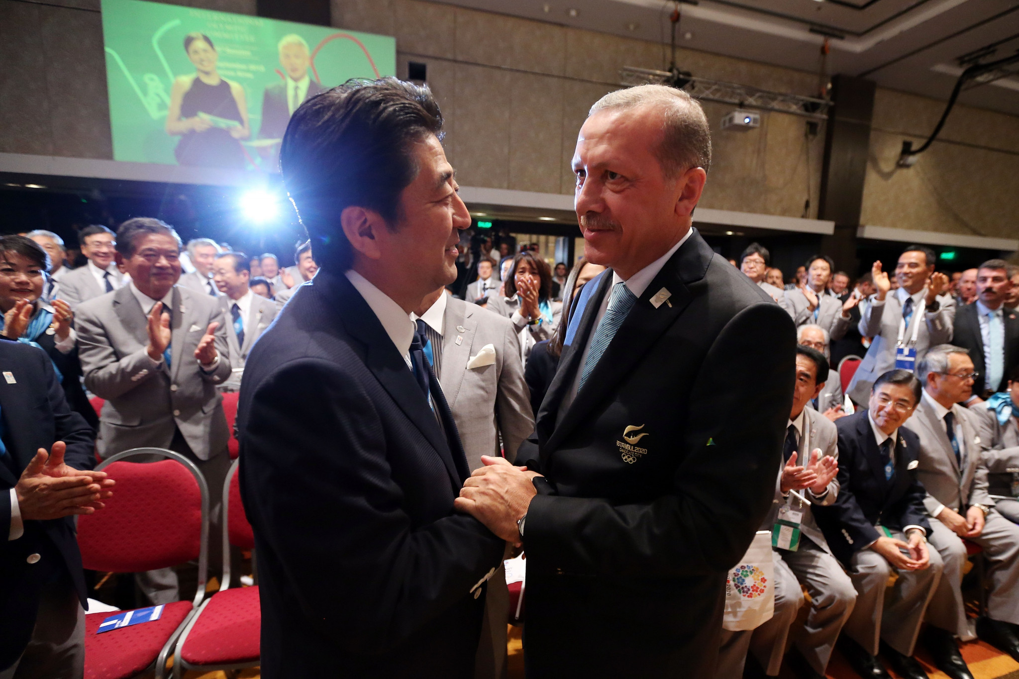 Turkish President Recep Tayyip Erdoğan congratulates the late Japanese Shinzo Abe after Tokyo defeated Istanbul to secure the 2020 Olympics hosting rights ©Getty Images