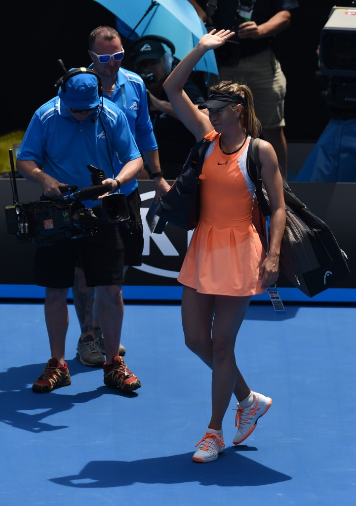 Maria Sharapova waves to the crowd after losing to Serena Williams in the quarter-finals of the Australian Open ©Getty Images
