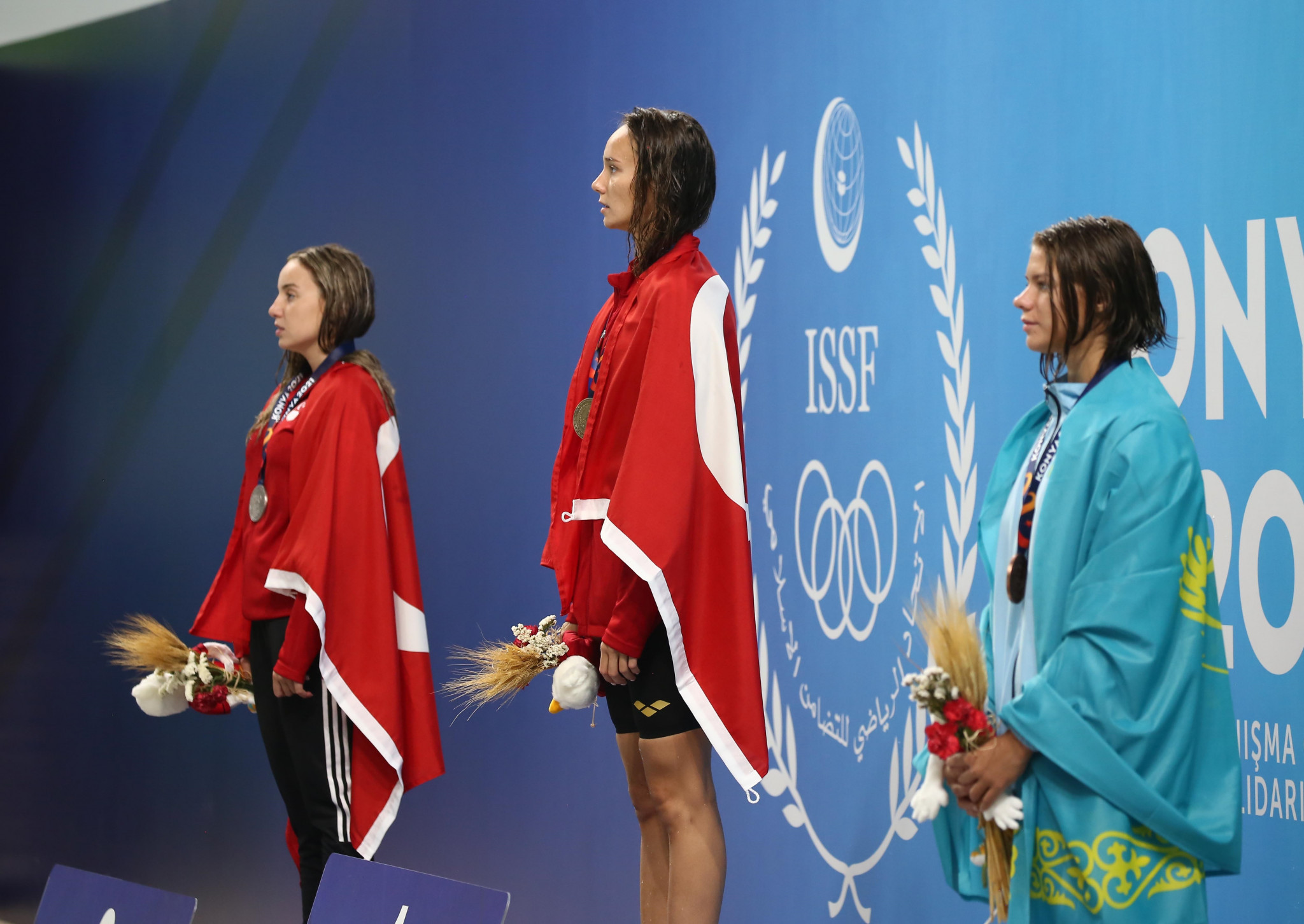 Viktoria Gunes stands atop the podium after winning the women's 100m breaststroke final ©Konya 2021