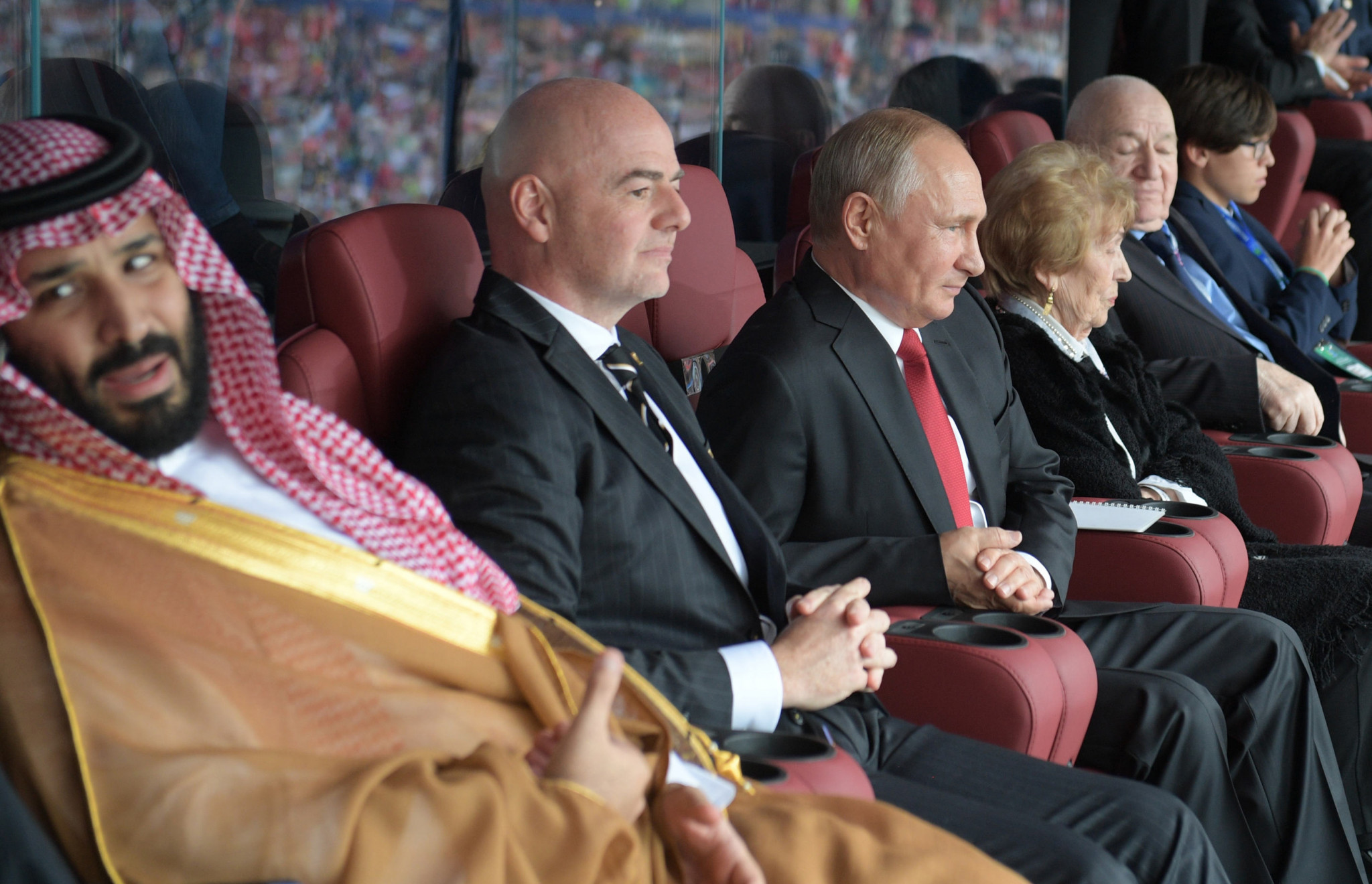 Crown Prince Mohammed bin Salman Al Saud, left, FIFA President Gianni Infantino, centre, and Russian President Vladimir Putin watched the opening match of the 2018 World Cup together ©Getty Images