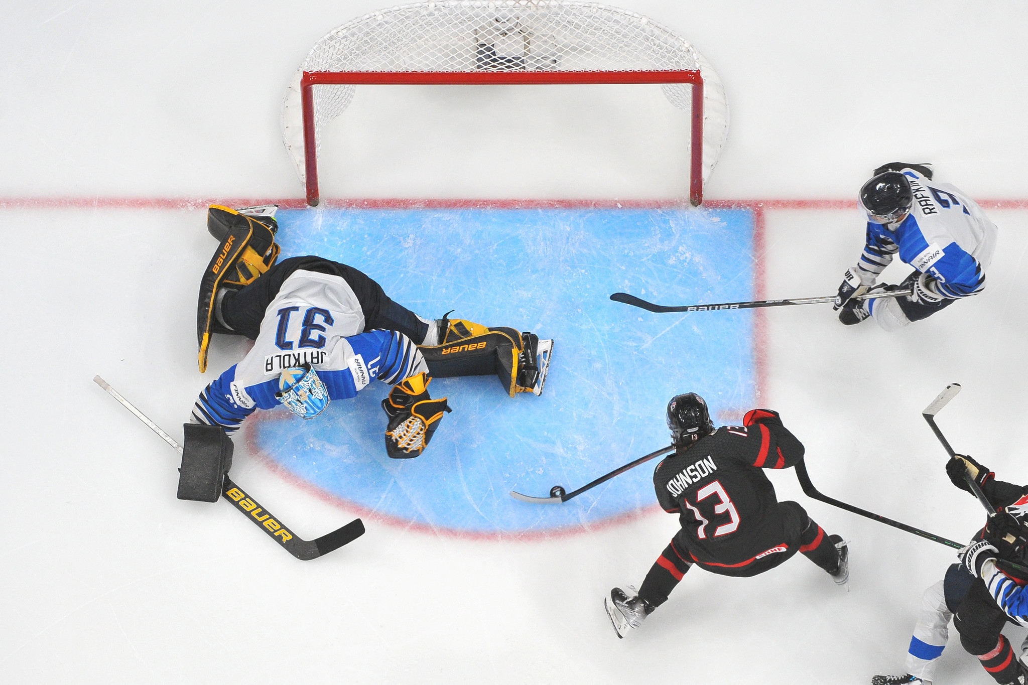 Canada overcome Finland in overtime to win IIHF World Junior Championship