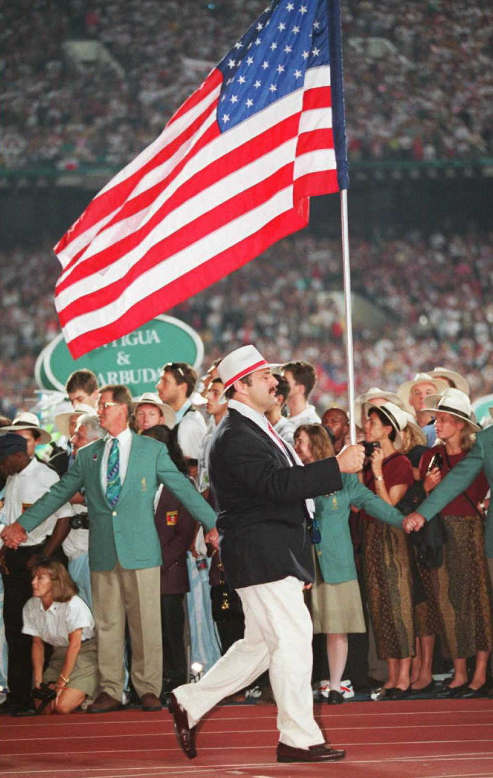 Bruce Baumgartner carried the United States flag at his fourth and final Olympics in 1996 ©Getty Images