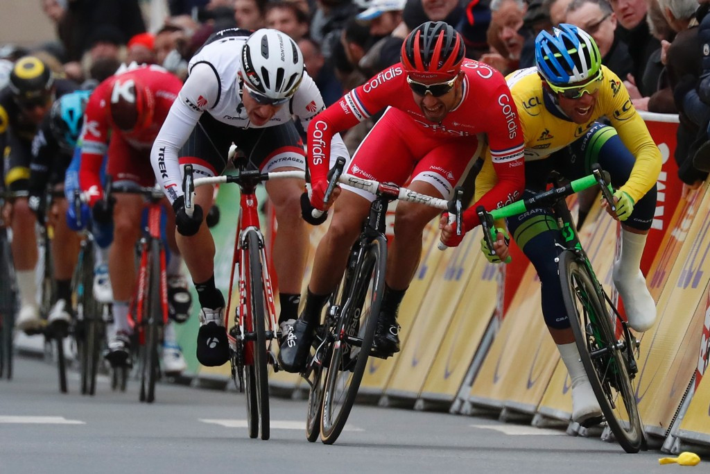 Nacer Bouhanni (left) was relegated after colliding with Michael Matthews (right) with the race leader awarded the stage win ©Getty Images