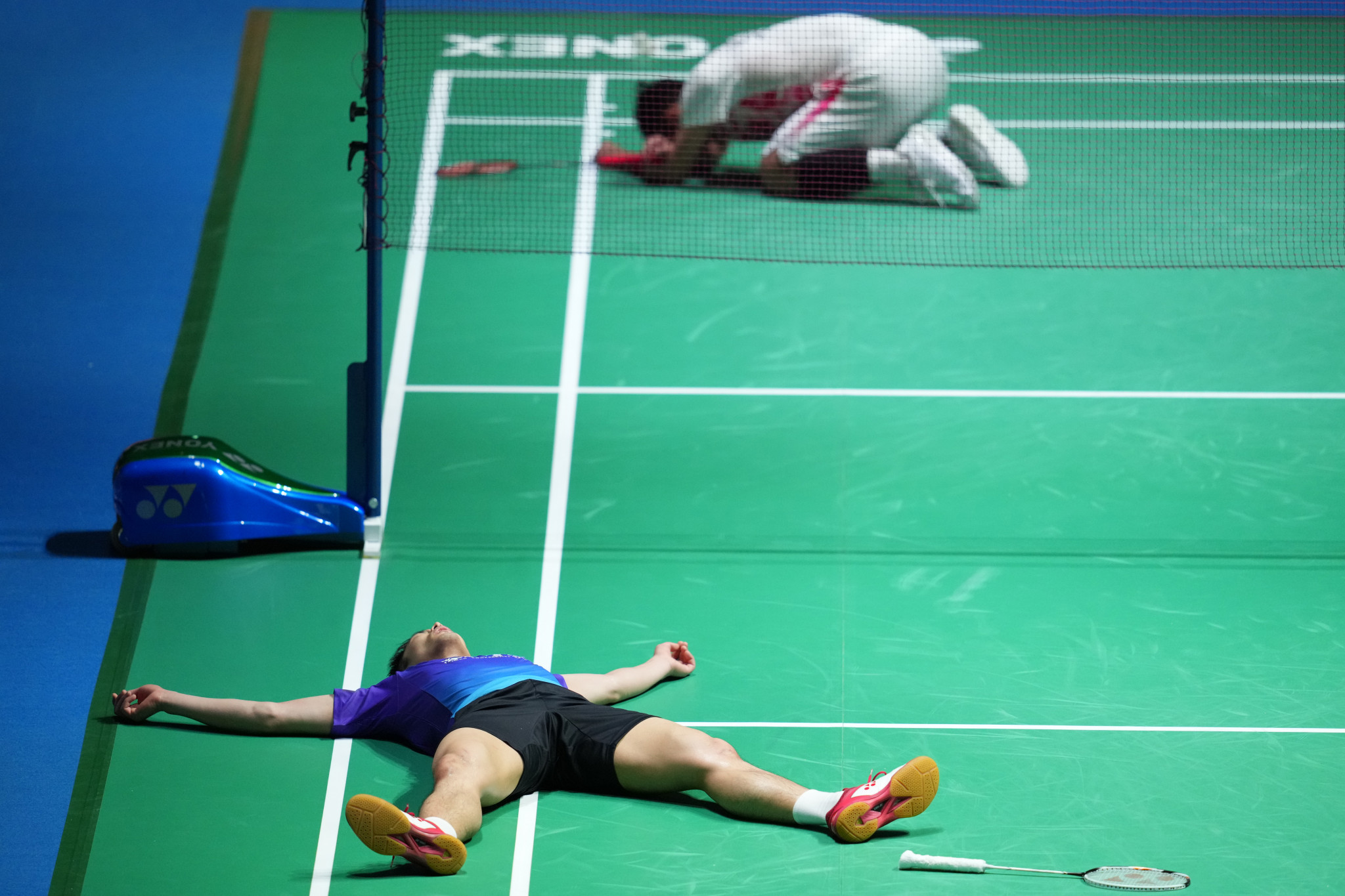 Chou Tien Chen, bottom, came from behind to beat Jonatan Christie after 71 minutes ©Getty Images
