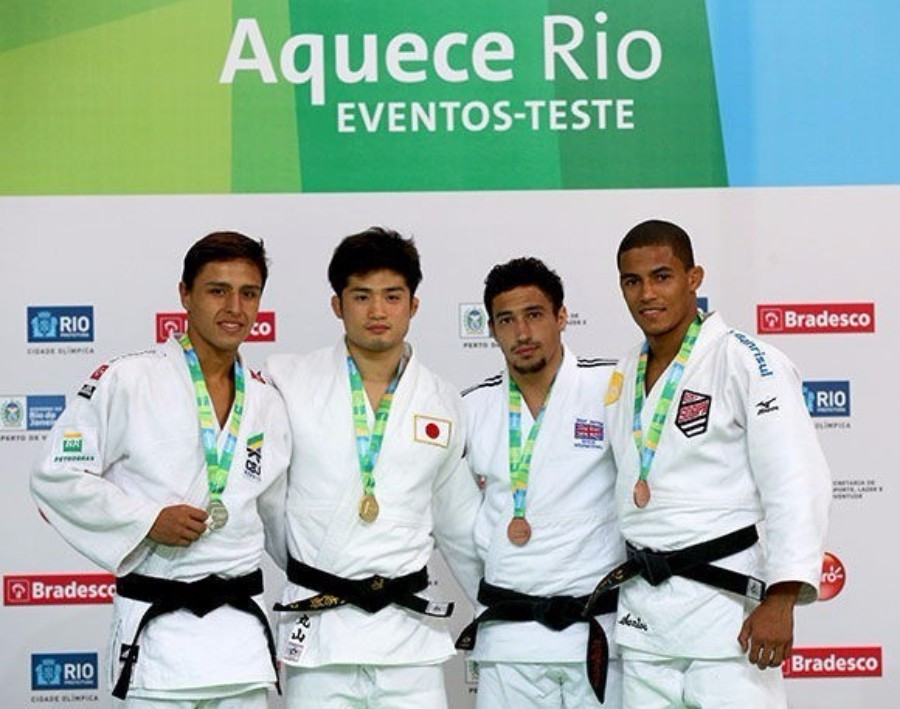 japan's Joshiro Maruyama (second left) claimed the men's under 66kg title ©IJF