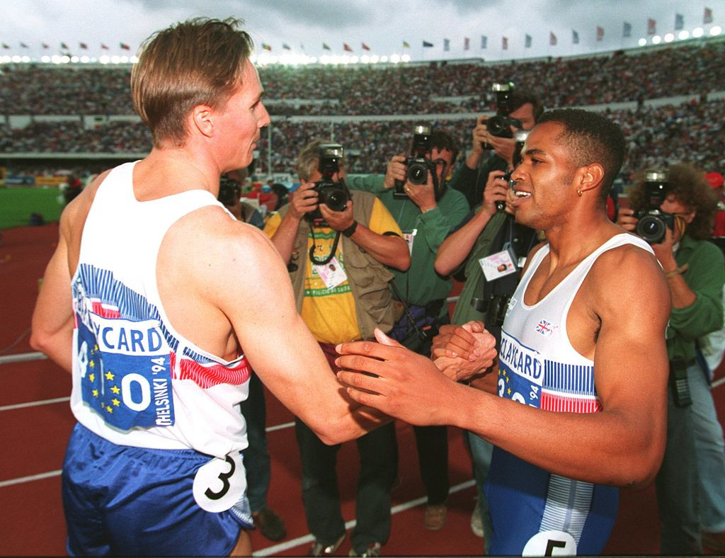 Roger Black, left, does the decent thing and congratulates fellow Briton Du'Aine Ladejo for relieving him of the European 400m title - two years later they would publicly clash at a press conference, and Black would have the last laugh ©Getty Images