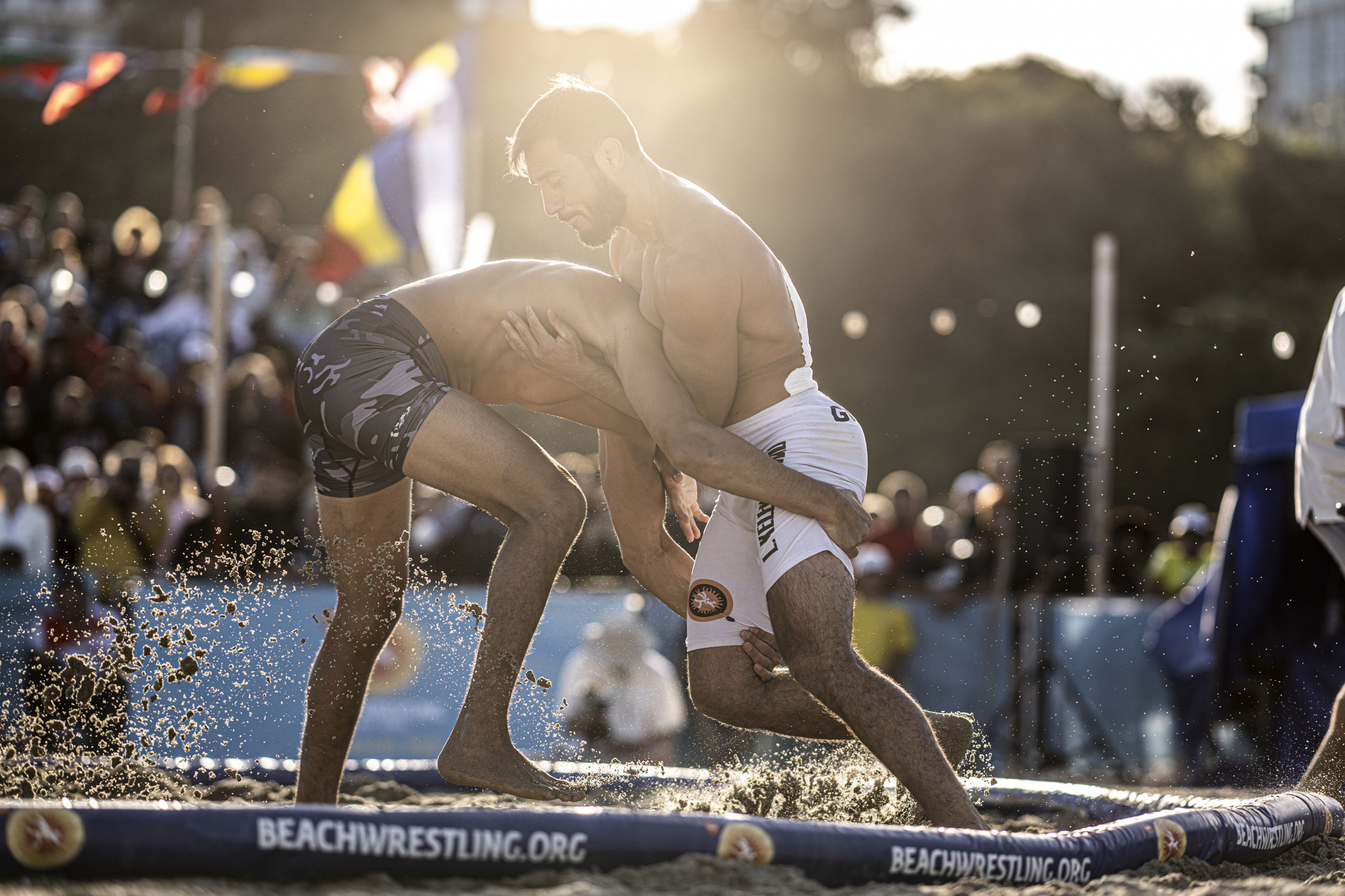 Levan Kelekhsashvili, right, defeated Ramiz Hasanov to win a third consecutive Beach Wrestling World Series event ©Getty Images