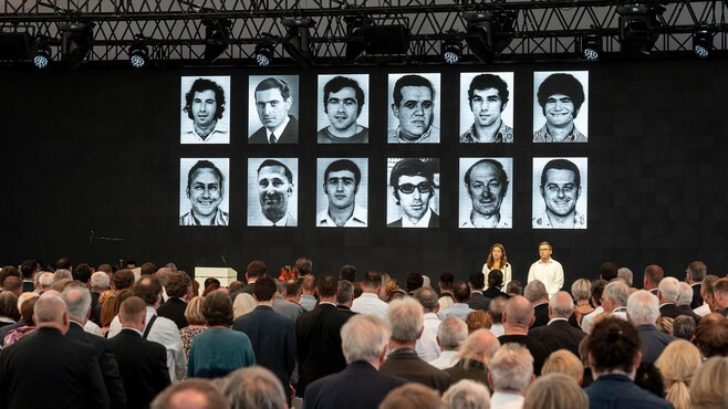 The faces of the victims of the 1972 Olympic attack were displayed during a moment's silence at the memorial service  ©IOC/Greg Martin