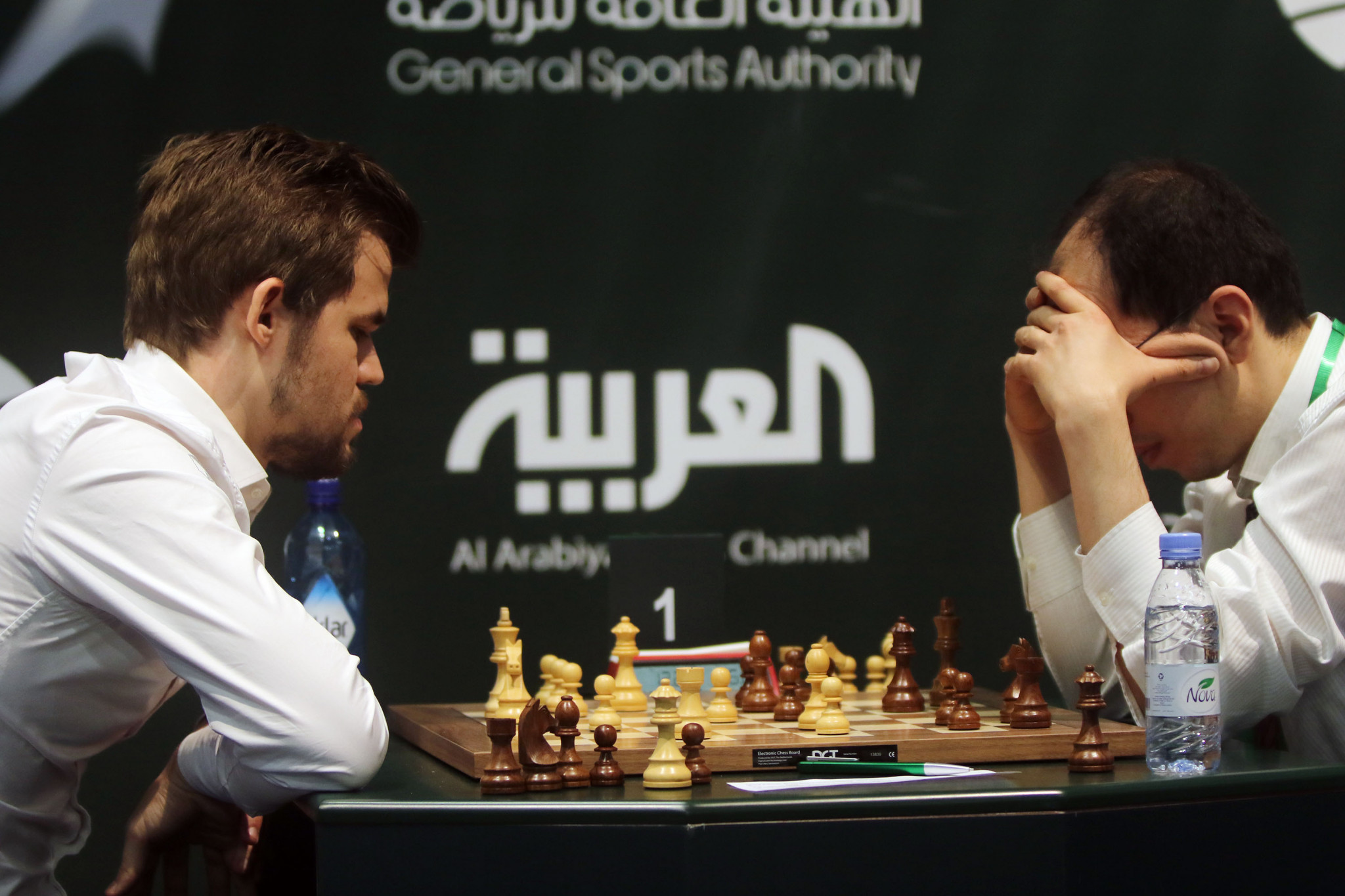 Uzbekistan's Rustam Kasimdzhanov, right, dismissed suggestions that Norway's Magnus Carlsen, left, had withdrawn because of suspected cheating as 