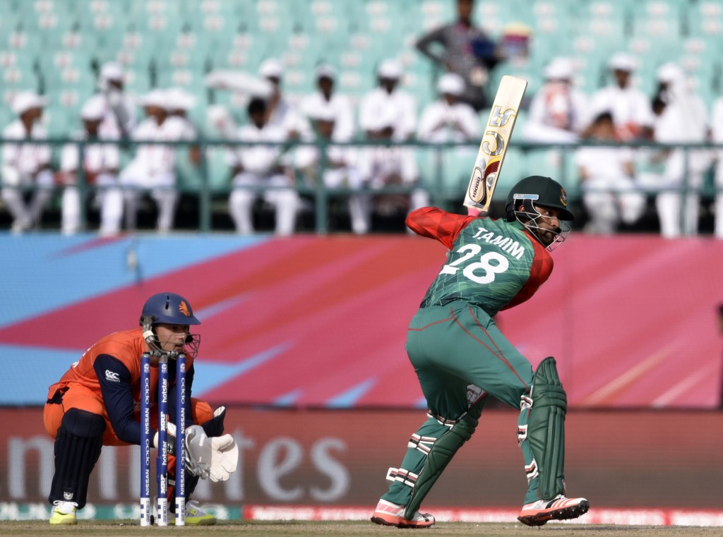 Tamim Iqbal hit an unbeaten 83 as Bangladesh beat The Netherlands by eight runs