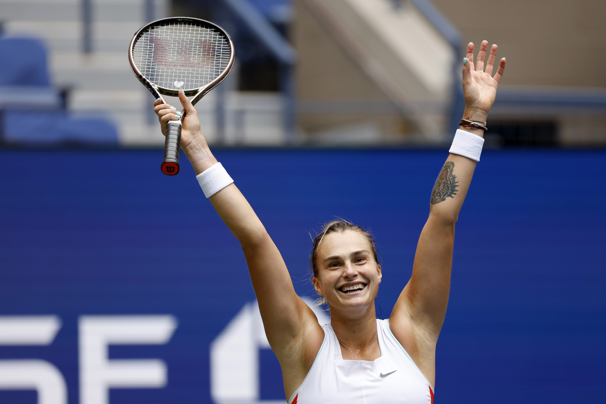 Aryna Sabalenka celebrates after reaching the last four of the women's singles ©Getty Images