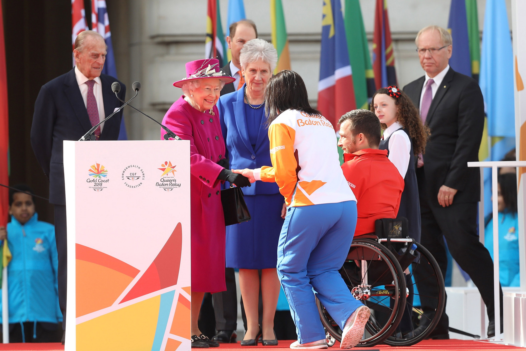 Queen Elizabeth II at the Queen's Baton Relay before the Gold Coast 2018 Commonwealth Games, as she shakes hands with cyclist Anna Meares ©Getty Images