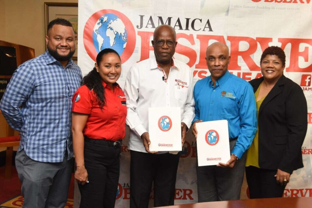 JOA President Christopher Samuda, second from right, believes the new deal wll inform and enlighten the Olympic Movement in Jamaica ©Jamaica Observer/JOA