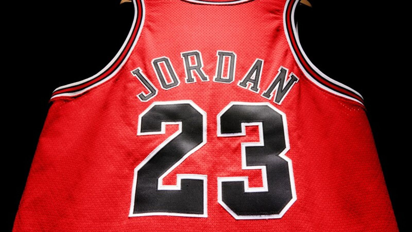 A Chicago Bulls jersey worn by Michael Jordan in the 1998 NBA finals has sold for a record $10.1 million at auction 