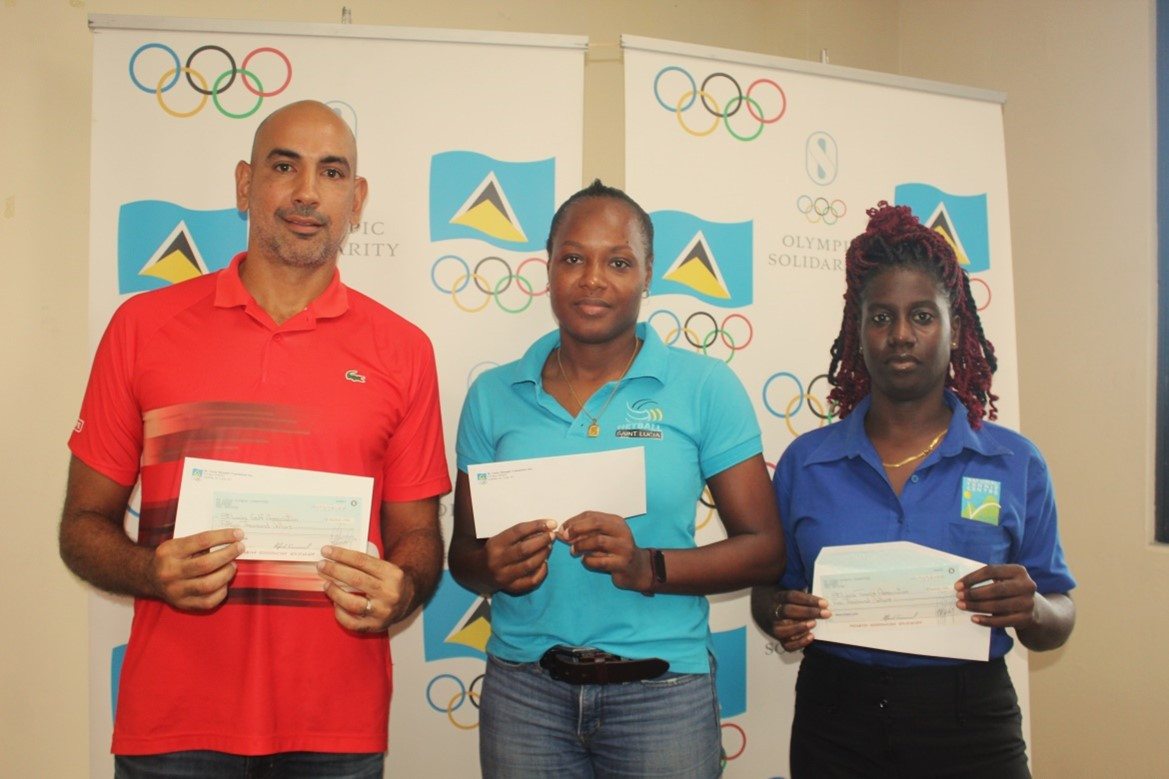 The Saint Lucia Olympic Committee donated funds to three of its member associations in La Clery ©SLOC