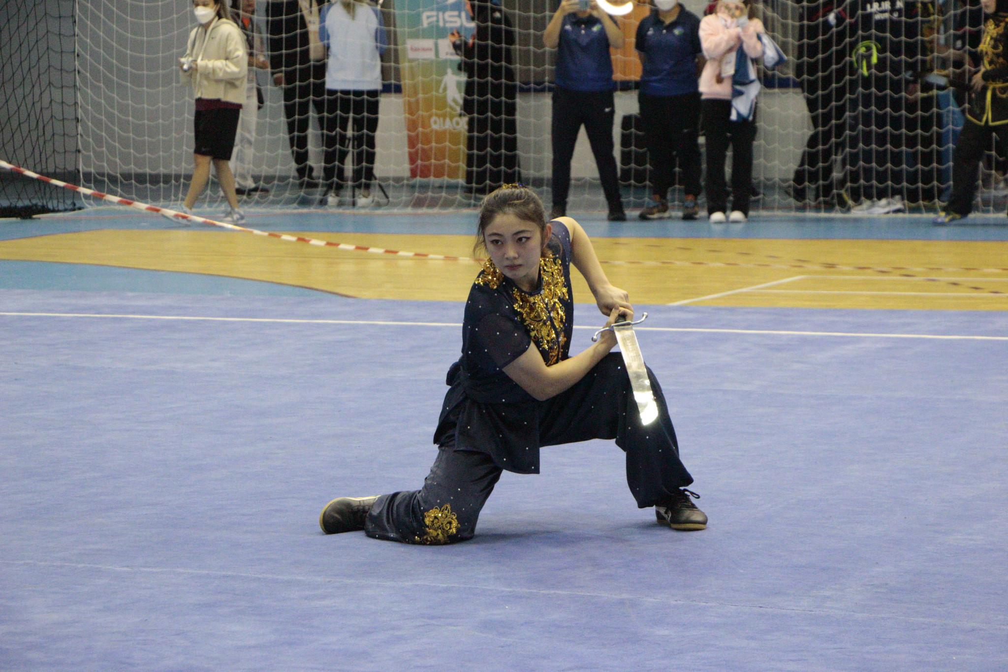 Po Yan Lau won the women's nandao gold for Hong Kong, while wielding a big sword ©FISU