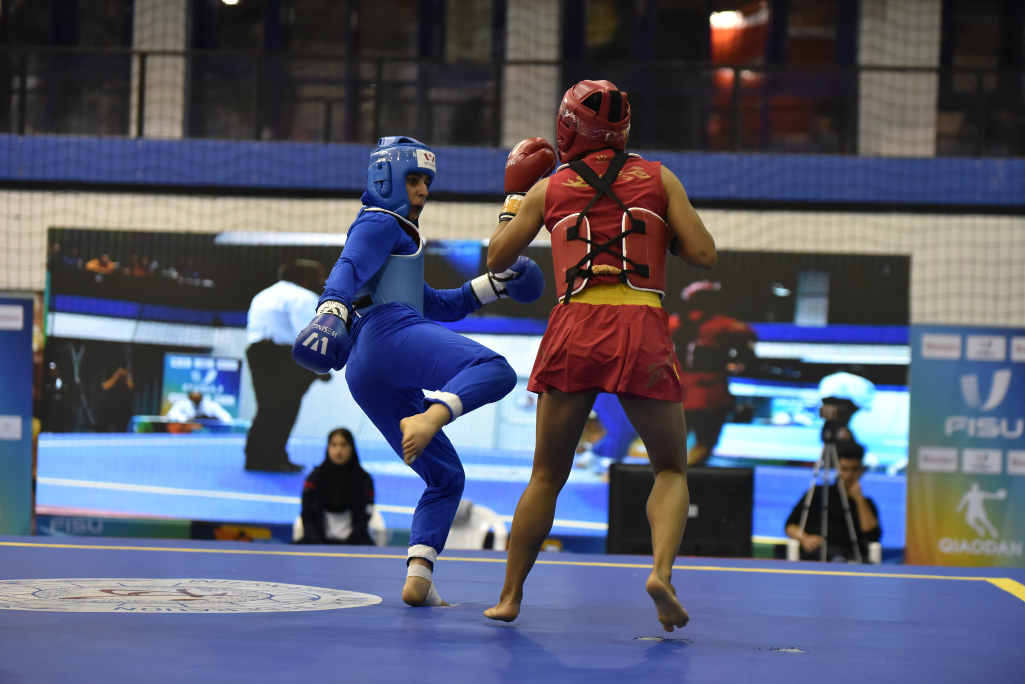 Wushu sanda saw bouts for men and women ©FISU