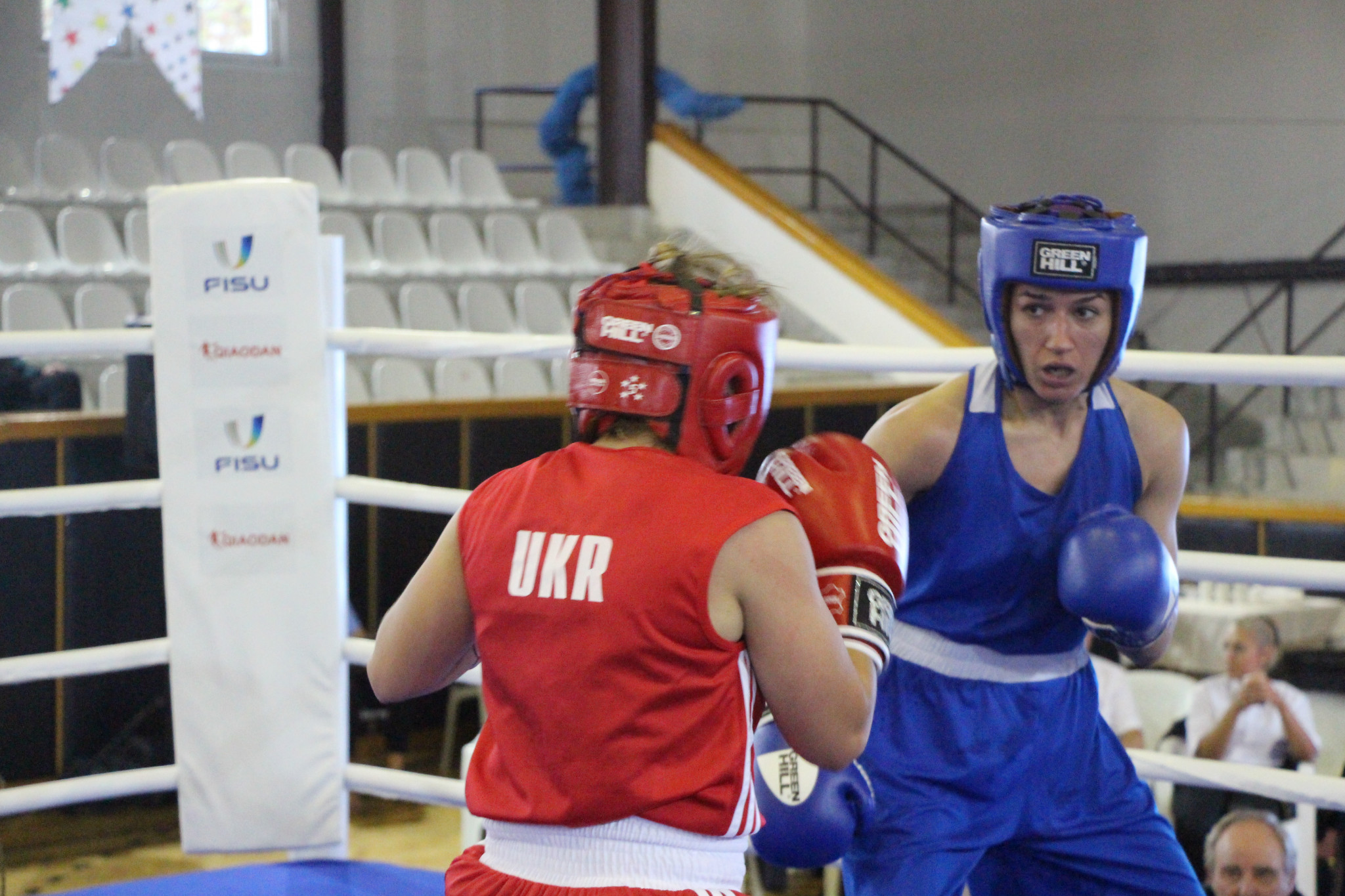 Women's World Championships competitor Hatice Akbas, right, was in the ring for Turkey ©FISU