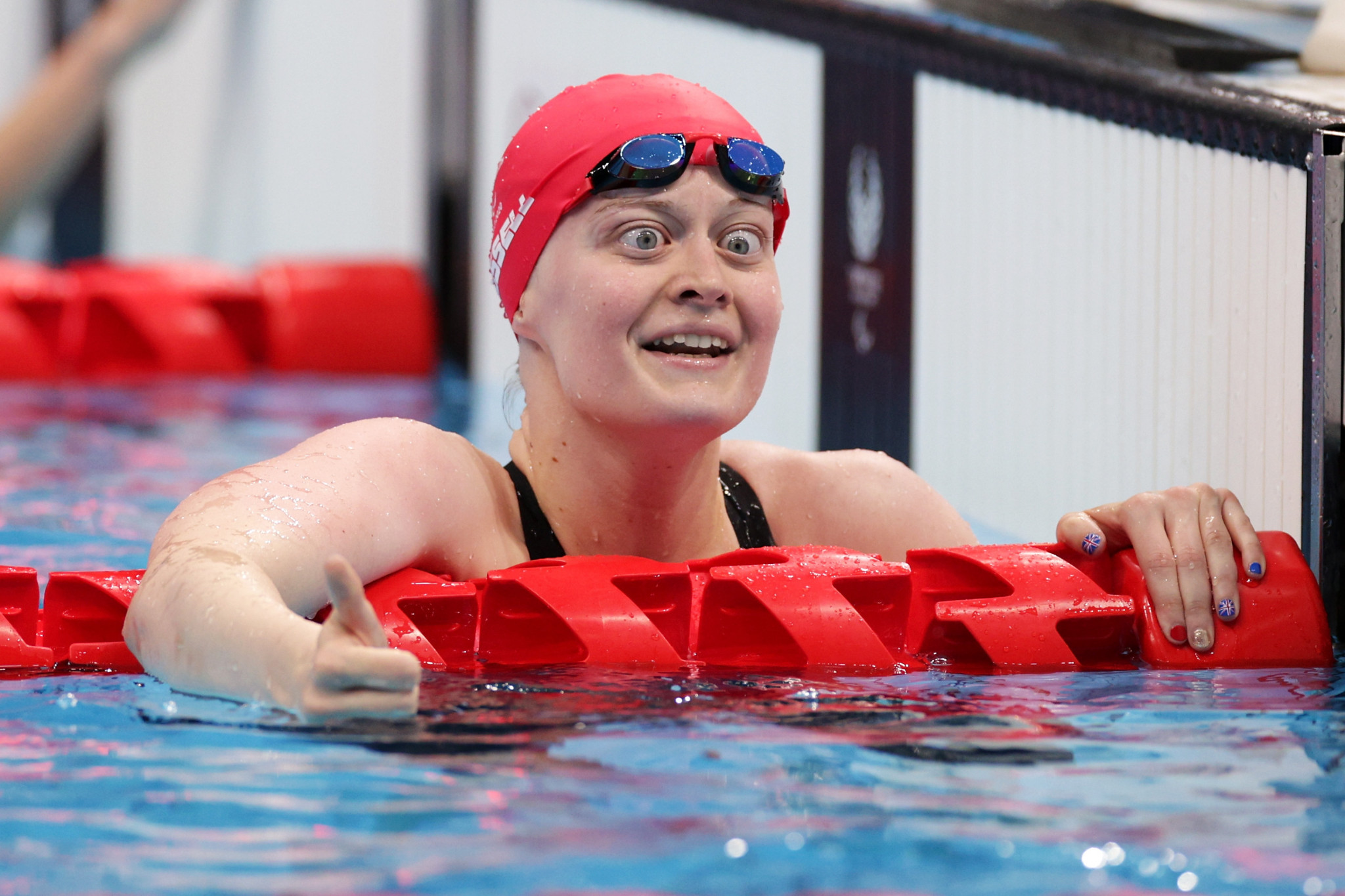 Three-time Para swimming champion Russell retires