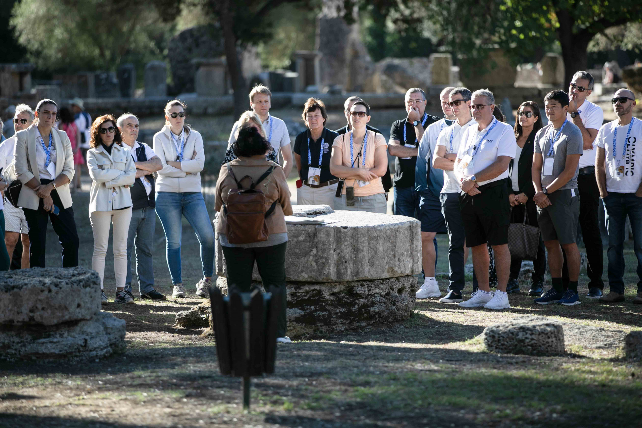 EOC members gather around the main tour guide as they were informed about the site's history and significance ©EOC