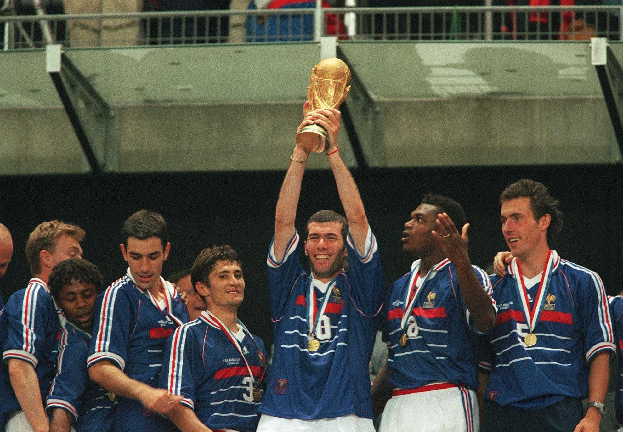 France's Zinedine Zidane, two-time scorer in the 1998 FIFA World Cup Final, lifting the trophy ©Getty Images