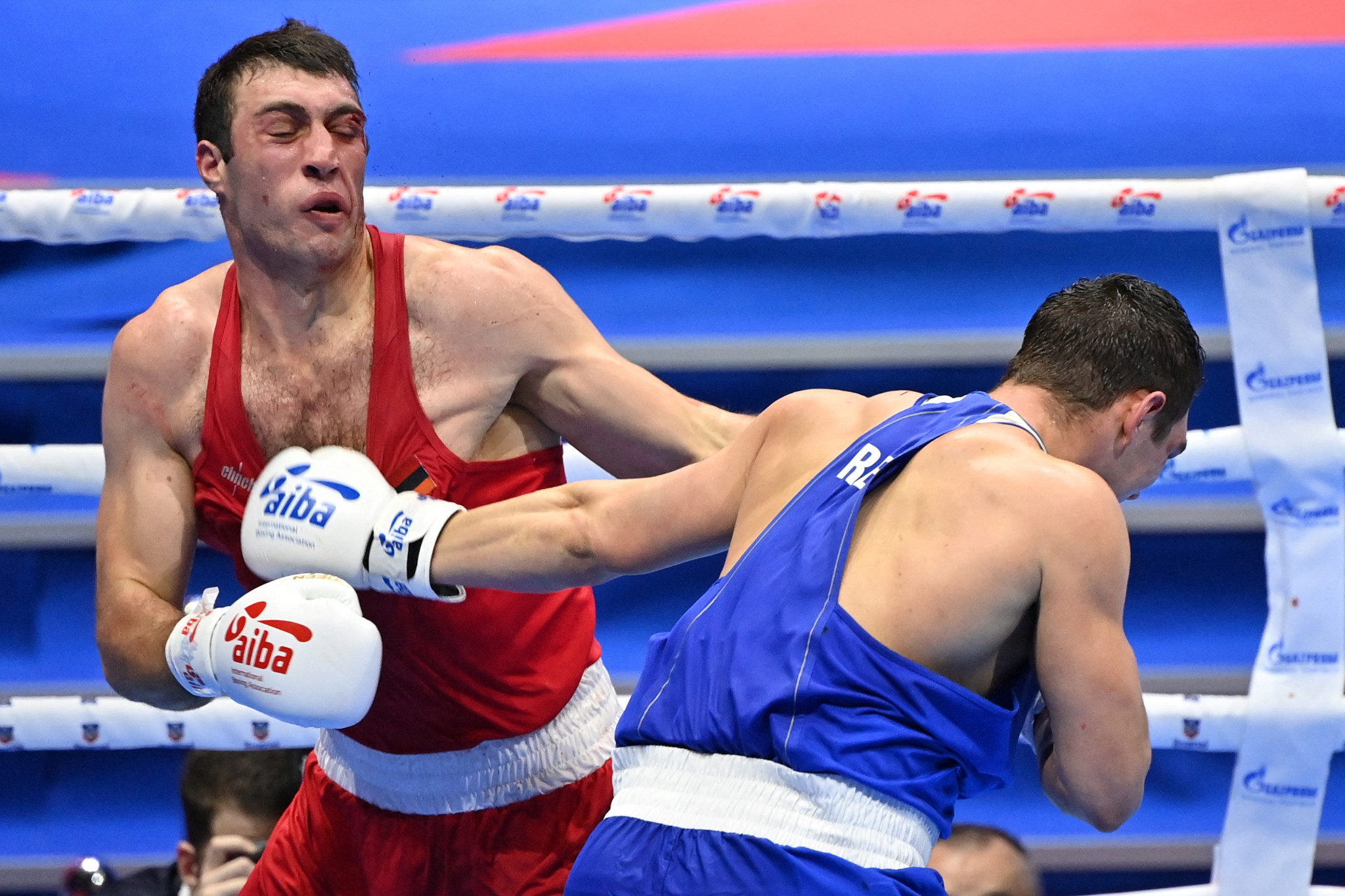 Davit Chaloyan of Armenia was able to fight when the referee stopped the bout after giving him two standing eight-counts against Ayoub Ghadfa Drissi El Aissaoui of Spain ©Getty Images