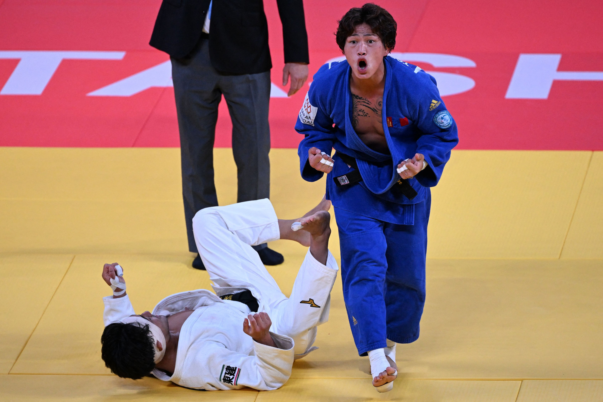 Tsogtbaatar Tsend-Ochir of Mongolia, right, also beat a Japanese judoka in the men's under-73kg decider as he got the better of Soichi Hashimoto in the final bout of the day ©Getty Images