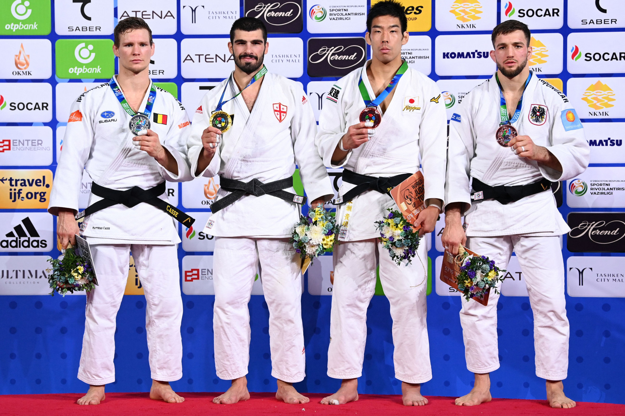 Japan's Takanori Nagase, second right, and Austria's Shamil Borchashvili, right, claimed the bronze medals in today's men's competition  ©Getty Images