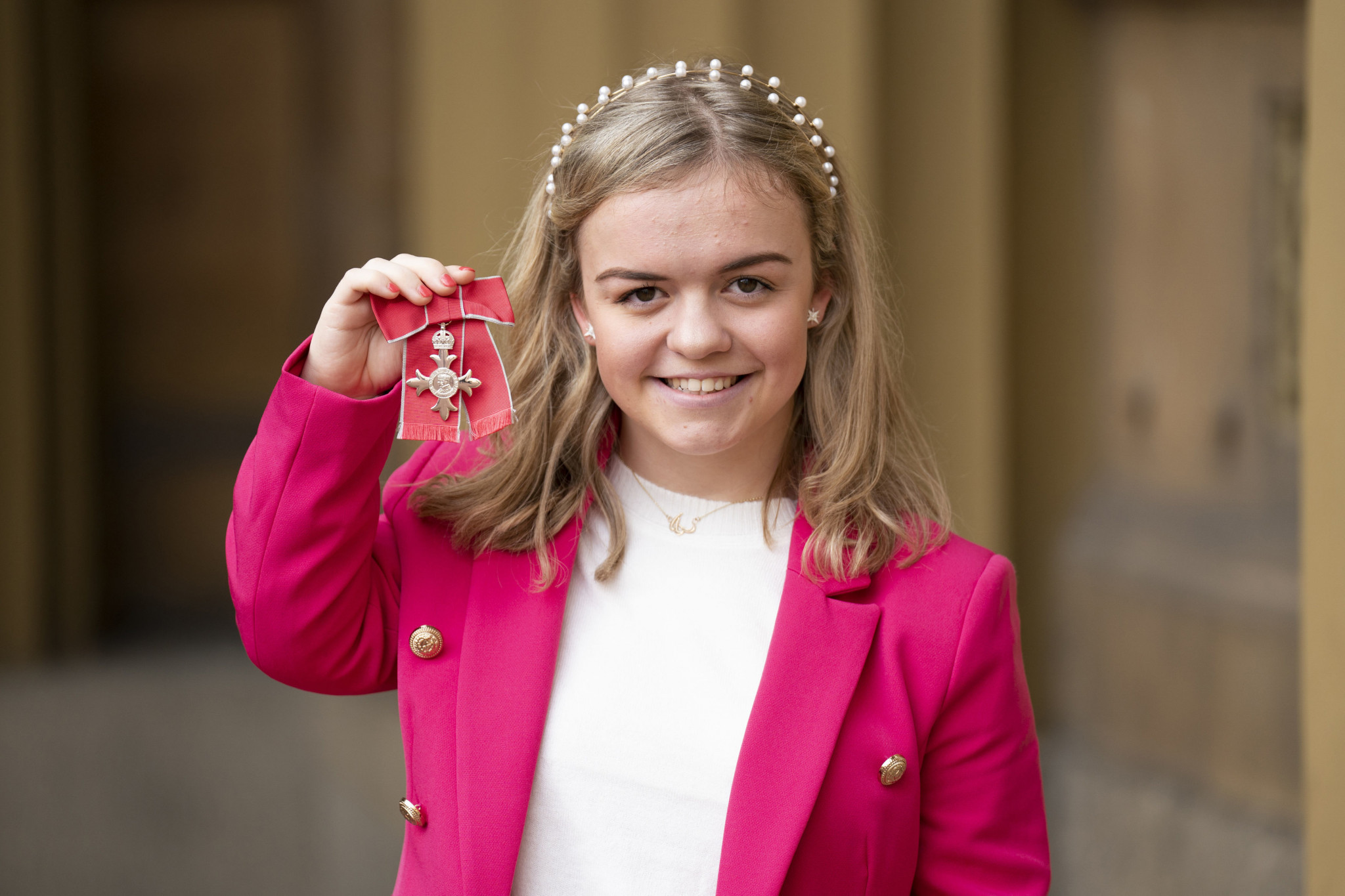 Maisie Summers-Newton pictured with her MBE ©Getty Images