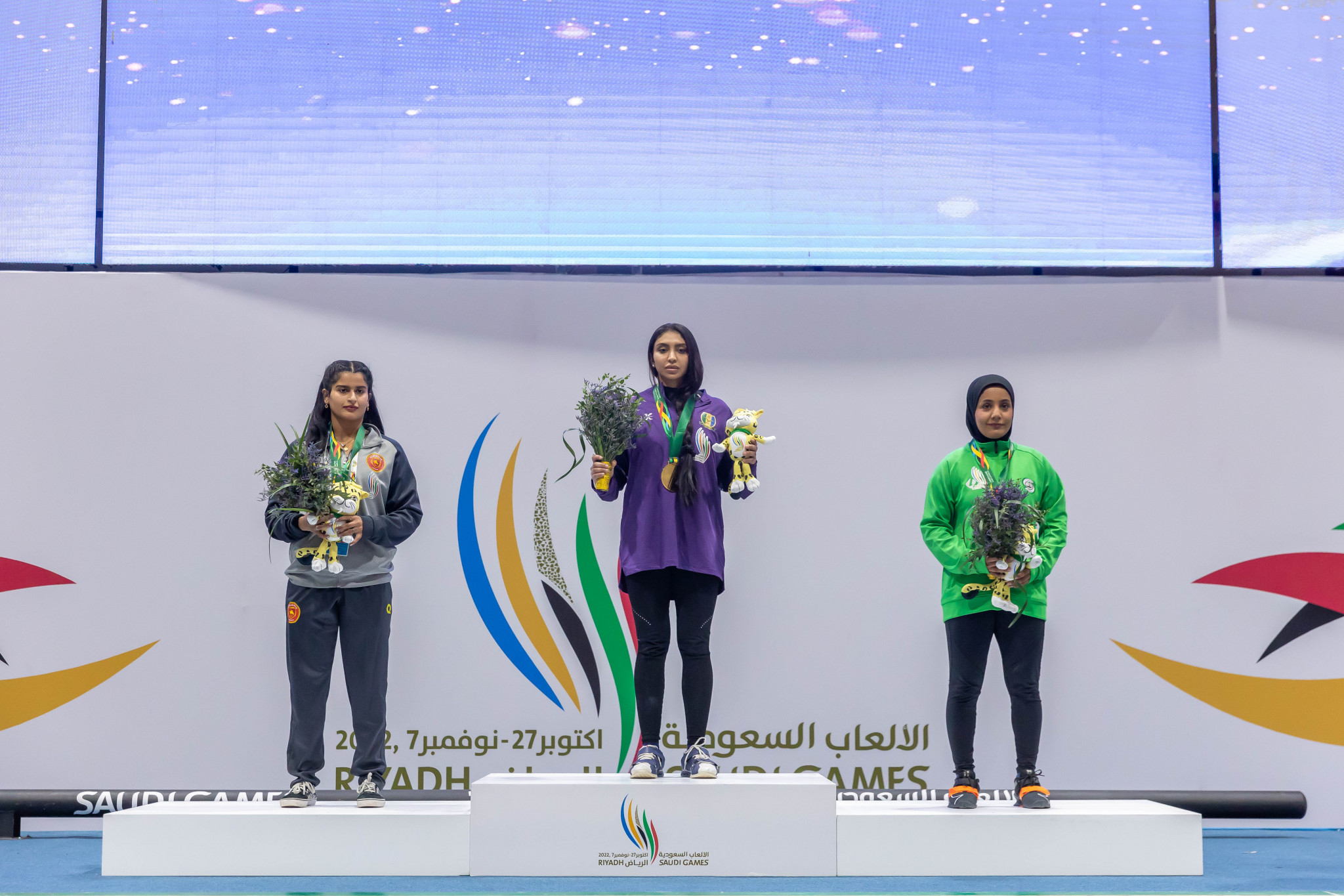 Nisrine Ali, centre, won the women's under-59kg class ©Saudi Games