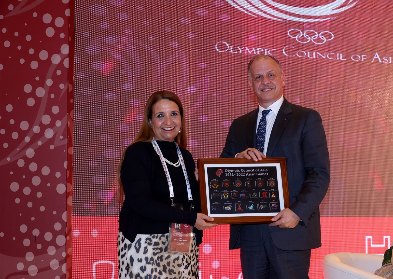OCA Gender Equity Committee chair Sheikha Hayat Bin Abdul Aziz Al Khalifa presents a gift to Prince Feisal ©OCA