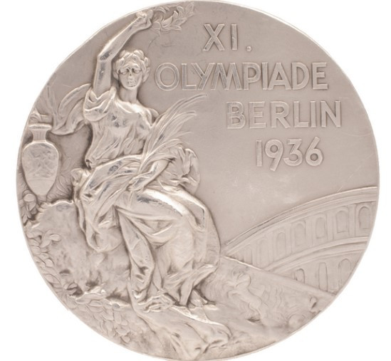 The Olympic silver medal won by Germany's Lutz Long, behind Jesse Owens in the long jump at Berlin 1936, has sold for a record sum ©SCP Auctions