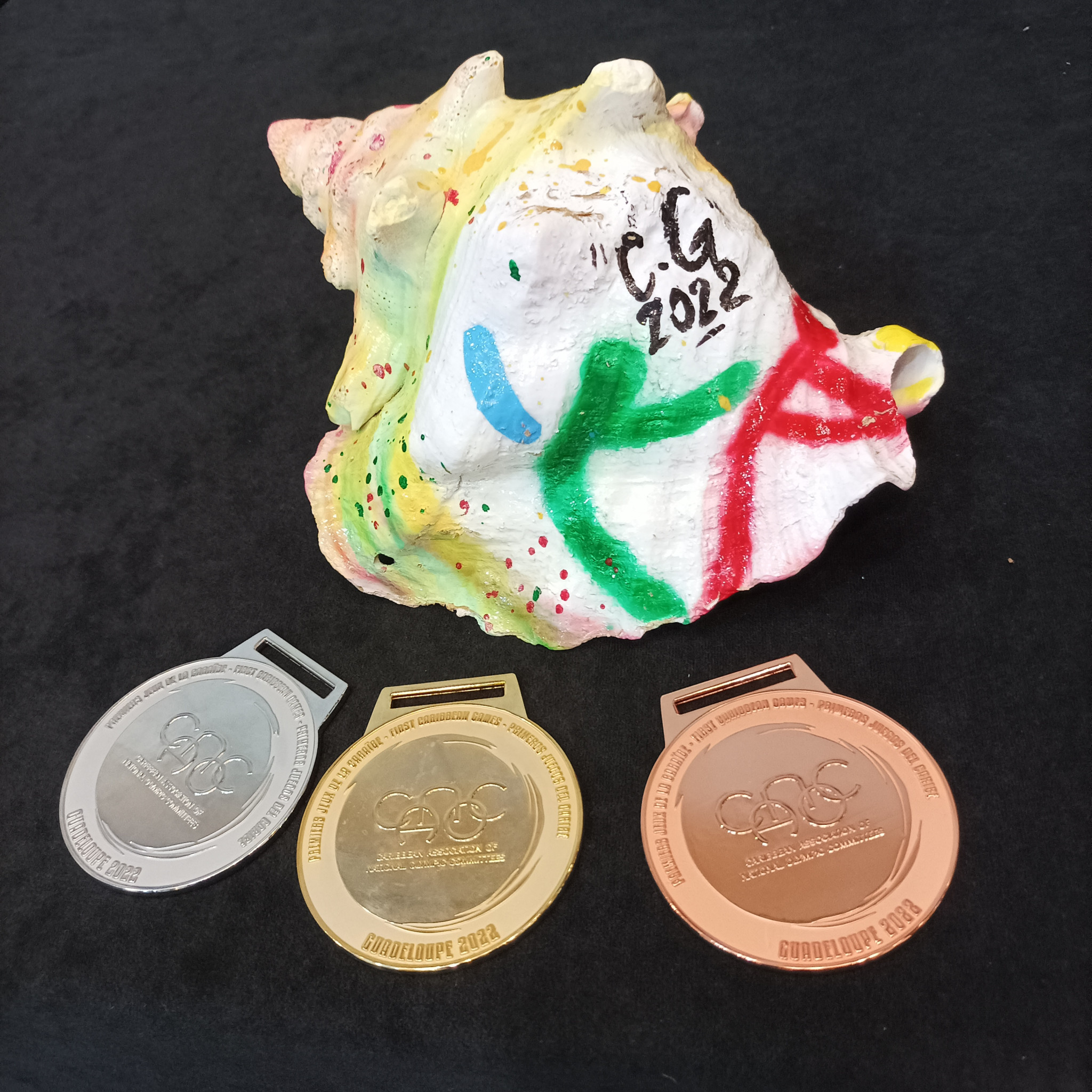 The conch shell and medals used for the inaugural Caribbean Games ©ITG