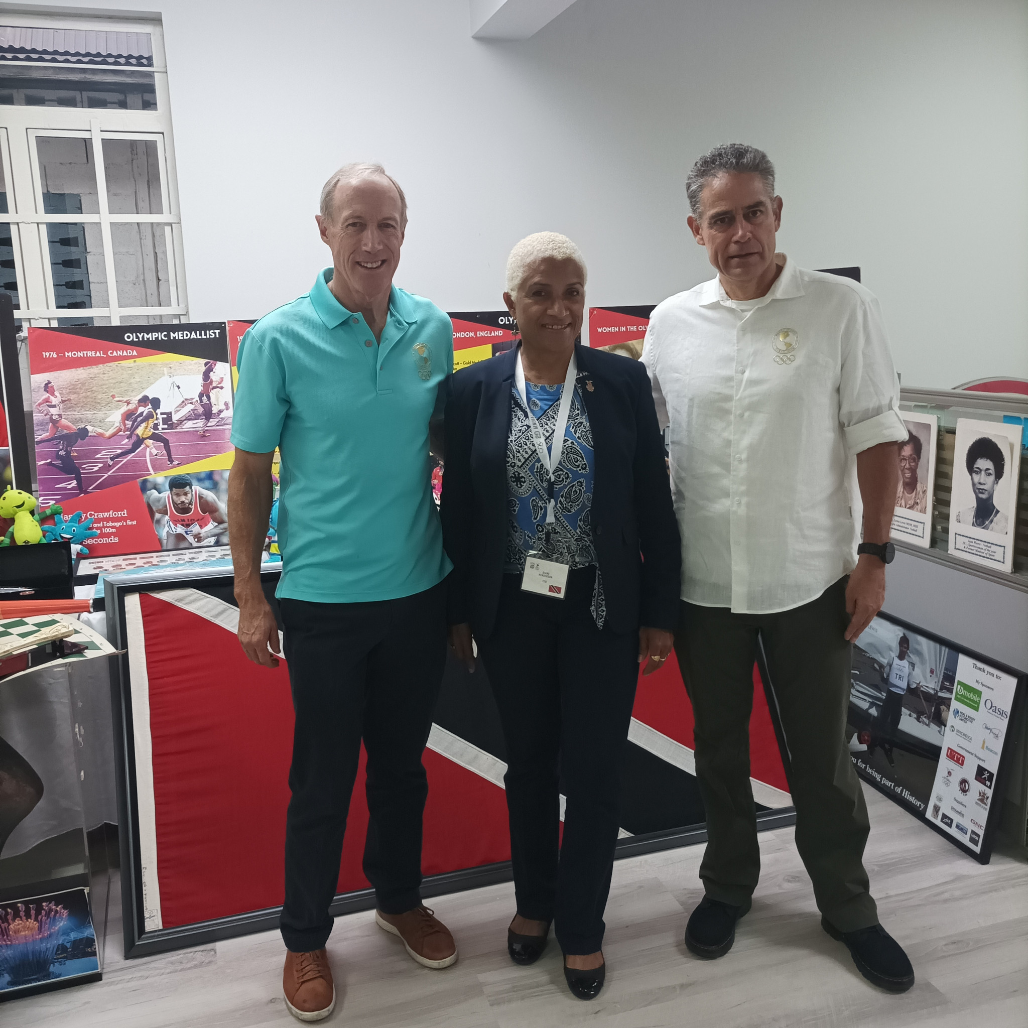 Trinidad and Tobago Olympic Committee President Diane Henderson, centre, with Panam Sports chief executive Ivar Sisniega, left, and Ricardo Probert, right ©ITG