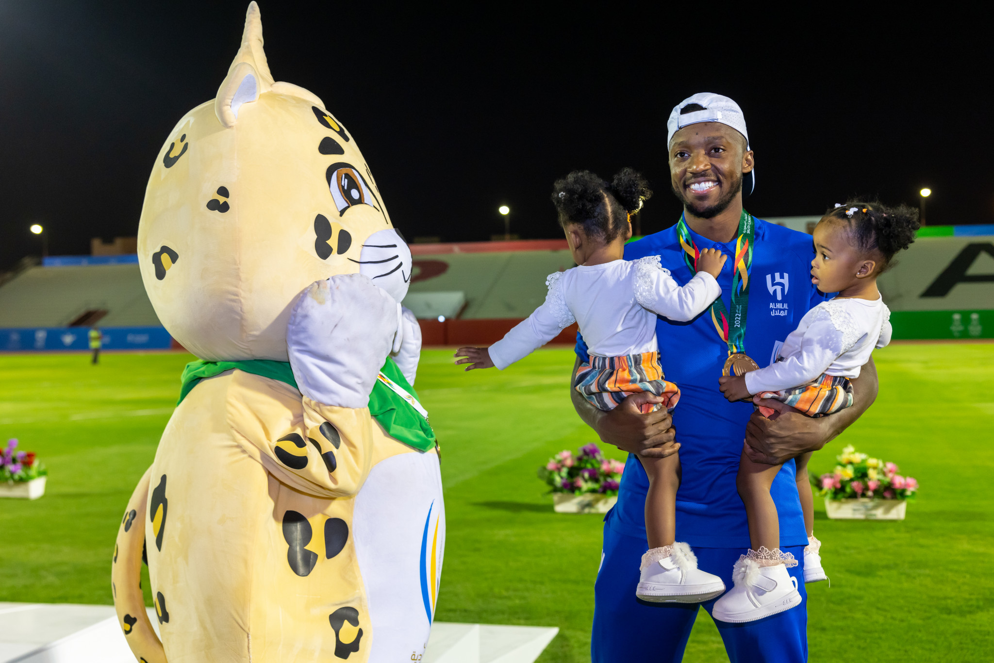 Abdullah Mohammed enjoyed a moment with his family after winning the men's 200 metres ©Saudi Games
