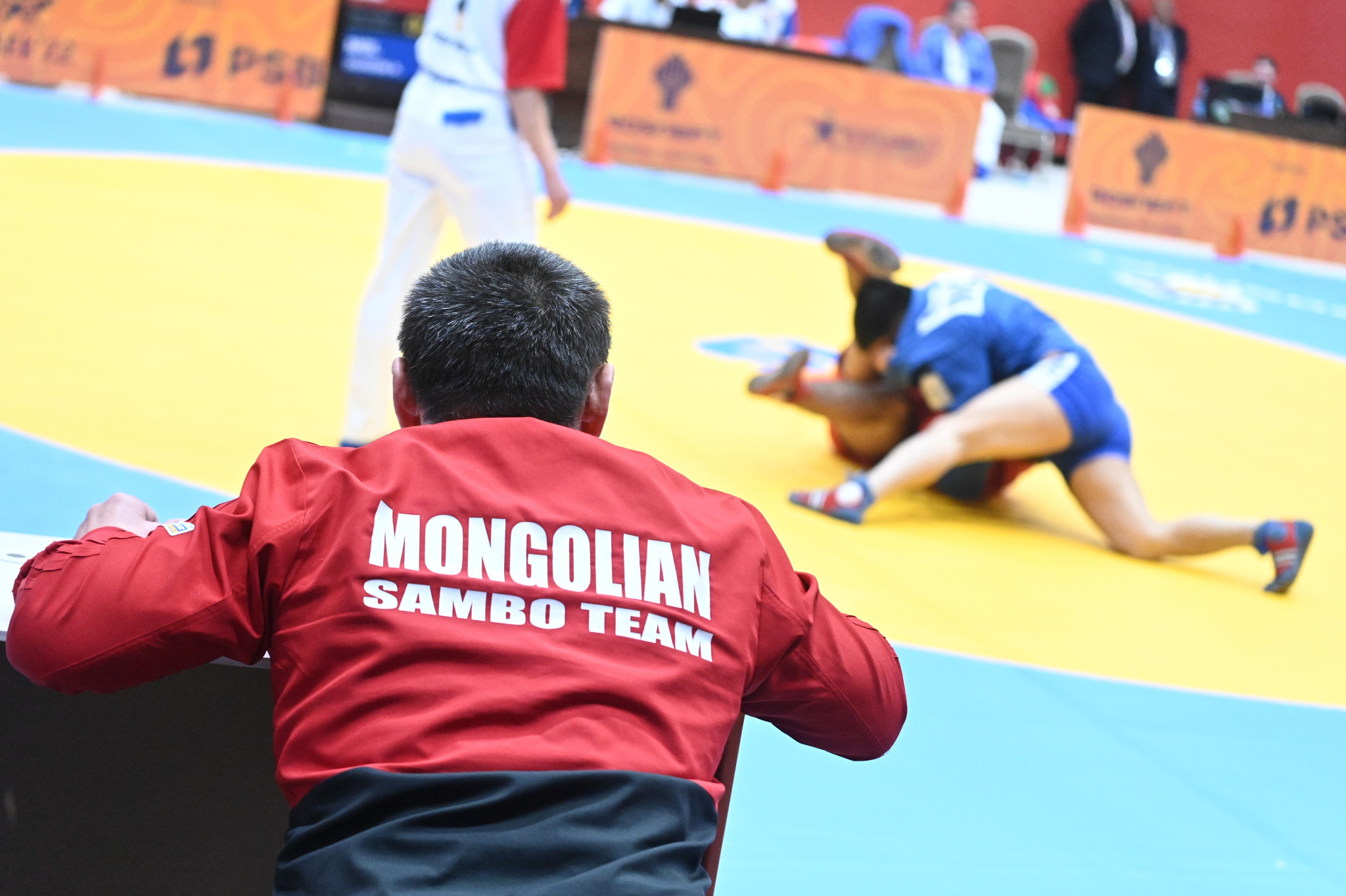 Mongolia's coaches had encouragement for their athletes ©FIAS