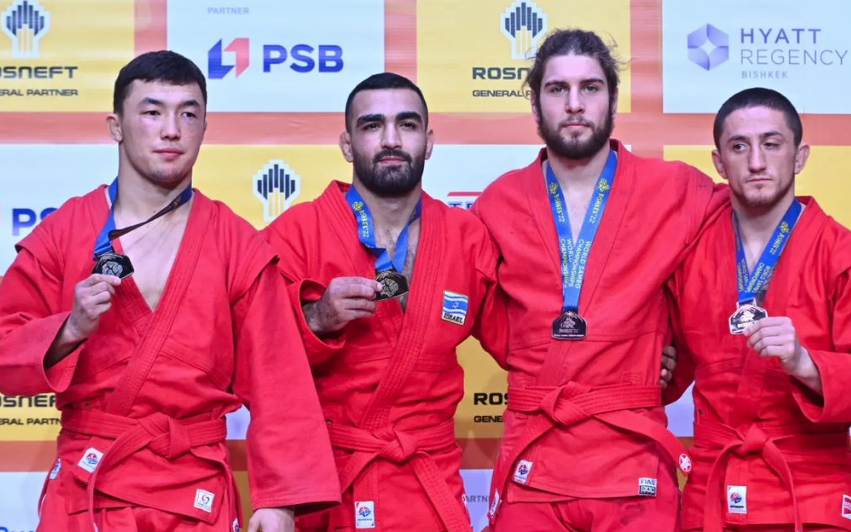 Tariel Abbasov, second left, won Israel's first gold medal of the World Championships ©FIAS