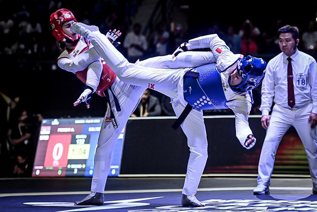 Aleksandra Perisic is on the receiving end of a shot from Soltero in the final ©World Taekwondo