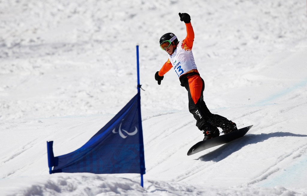 Chris Vos, pictured at Sochi 2014, followed his banked slalom victory yesterday with a snowboard cross success today ©Getty Images