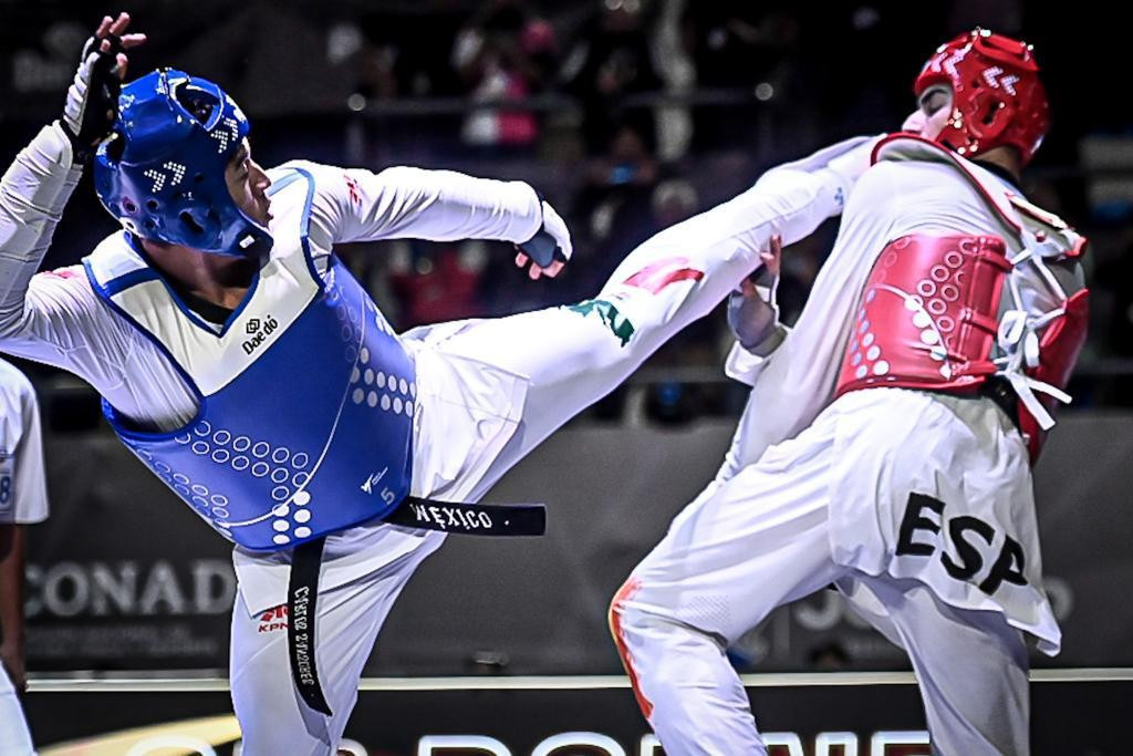 Ivan Garcia Martinez of Spain is on the receiving end of a kick from Sansores ©World Taekwondo