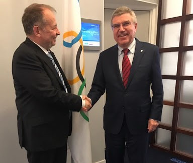 The Ukrainian Shooting Federation want IOC President Thomas Bach, right, to stop Vladimir Lisin, left, standing for re-election at this month's ISSF Congress ©Facebook