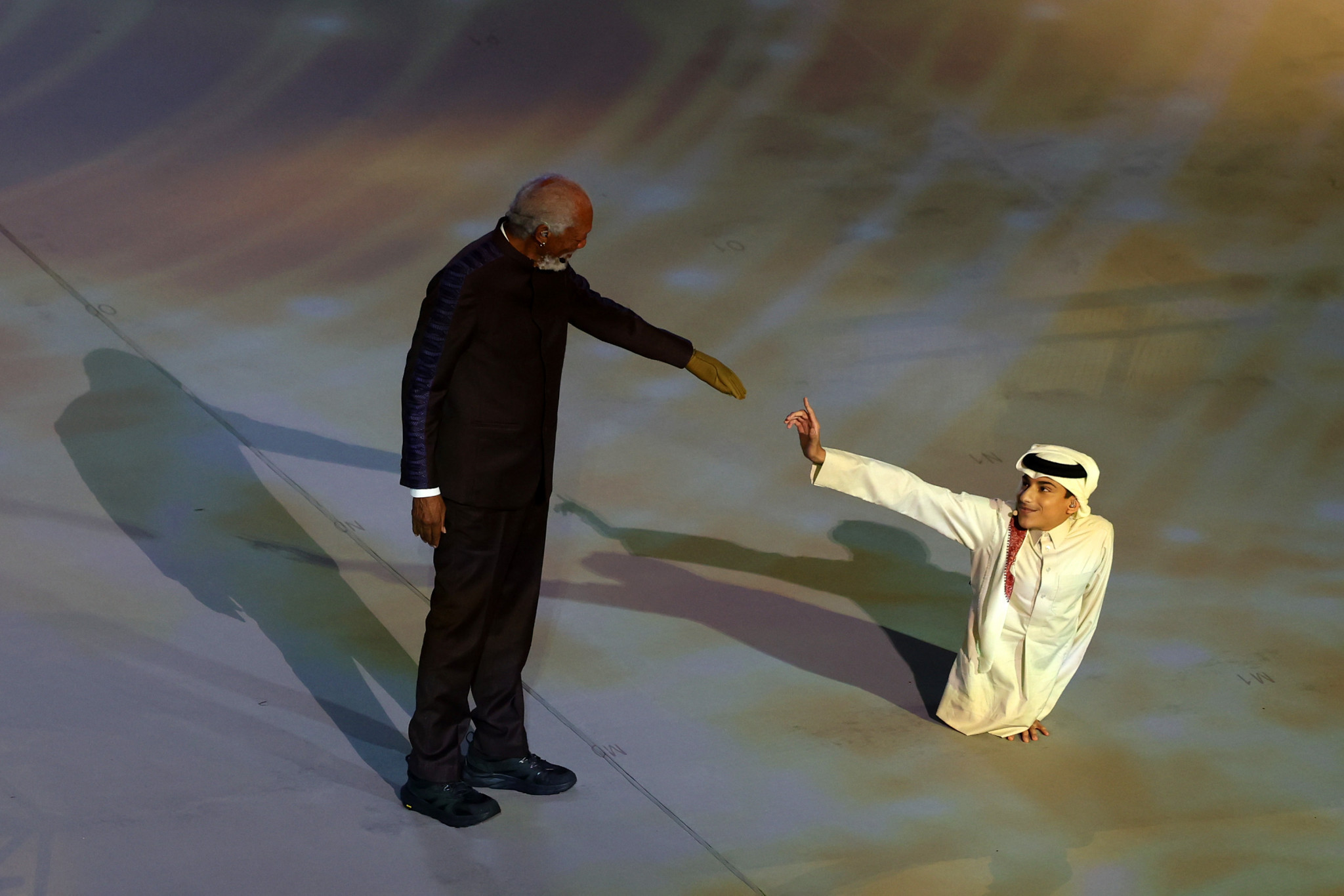 Actor Morgan Freeman was greeted by Qatari presenter Ghanim Al-Muftah ©Getty Images
