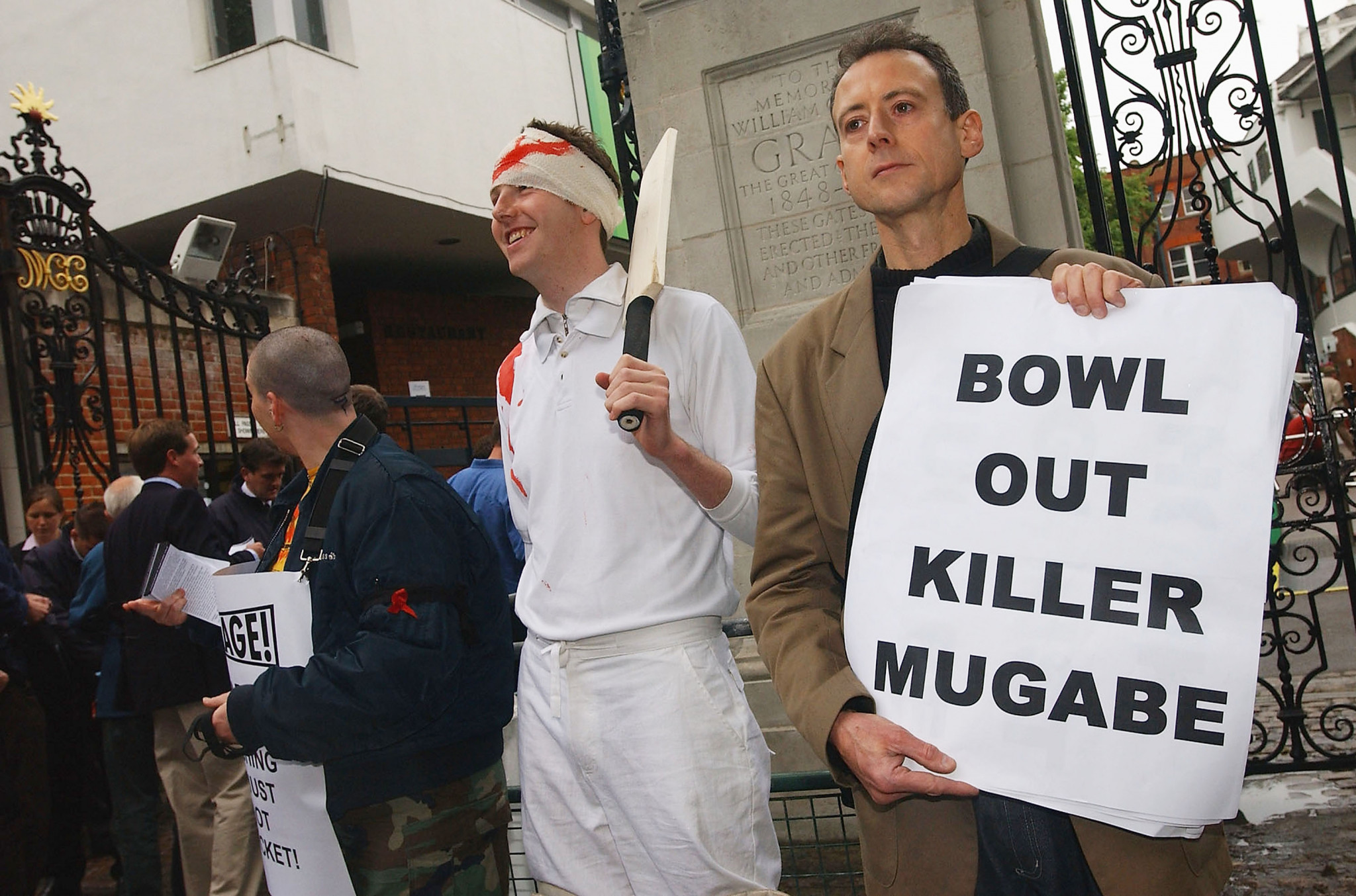 Activist Peter Tatchell, right, was amongst protesters against Robert Mugabe's regime and has also protested in Qatar this week ©Getty Images