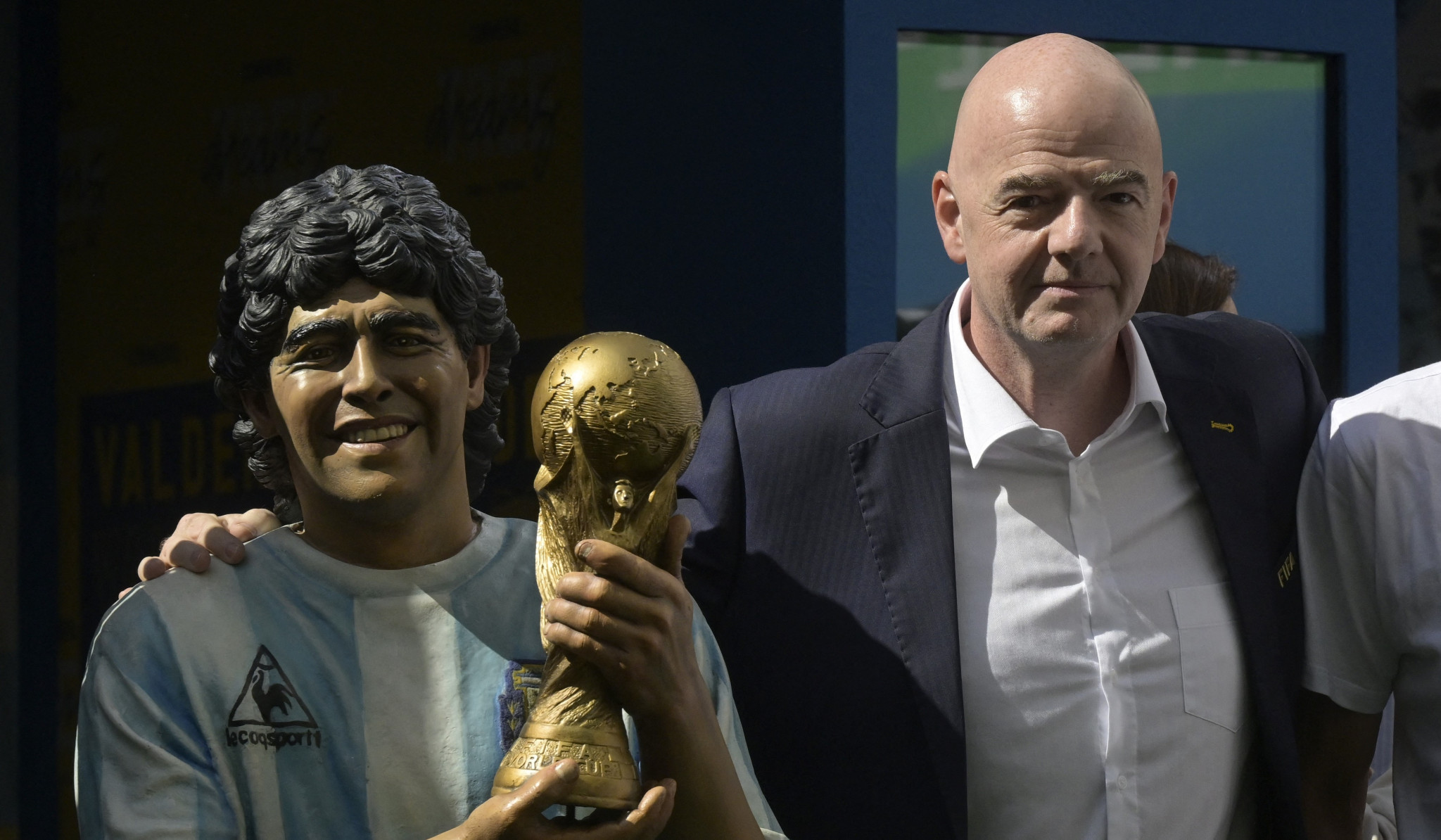 Gianni Infantino, right, wants "a day to celebrate Diego Armando Maradona" at every World Cup ©Getty Images