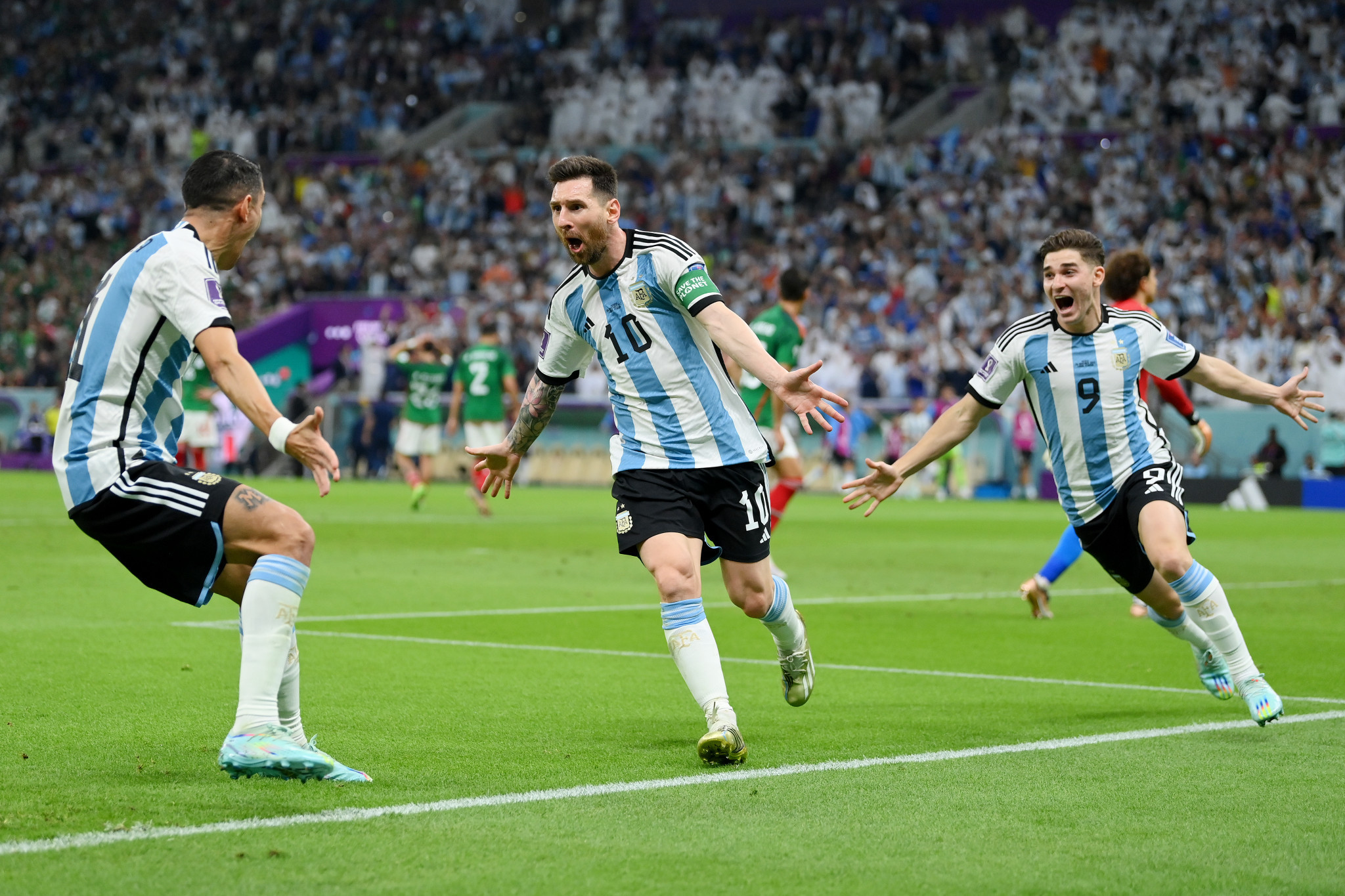 Lionel Messi, centre, produced a moment of magic as Argentina defeated Mexico 2-0 to keep their World Cup hopes alive ©Getty Images