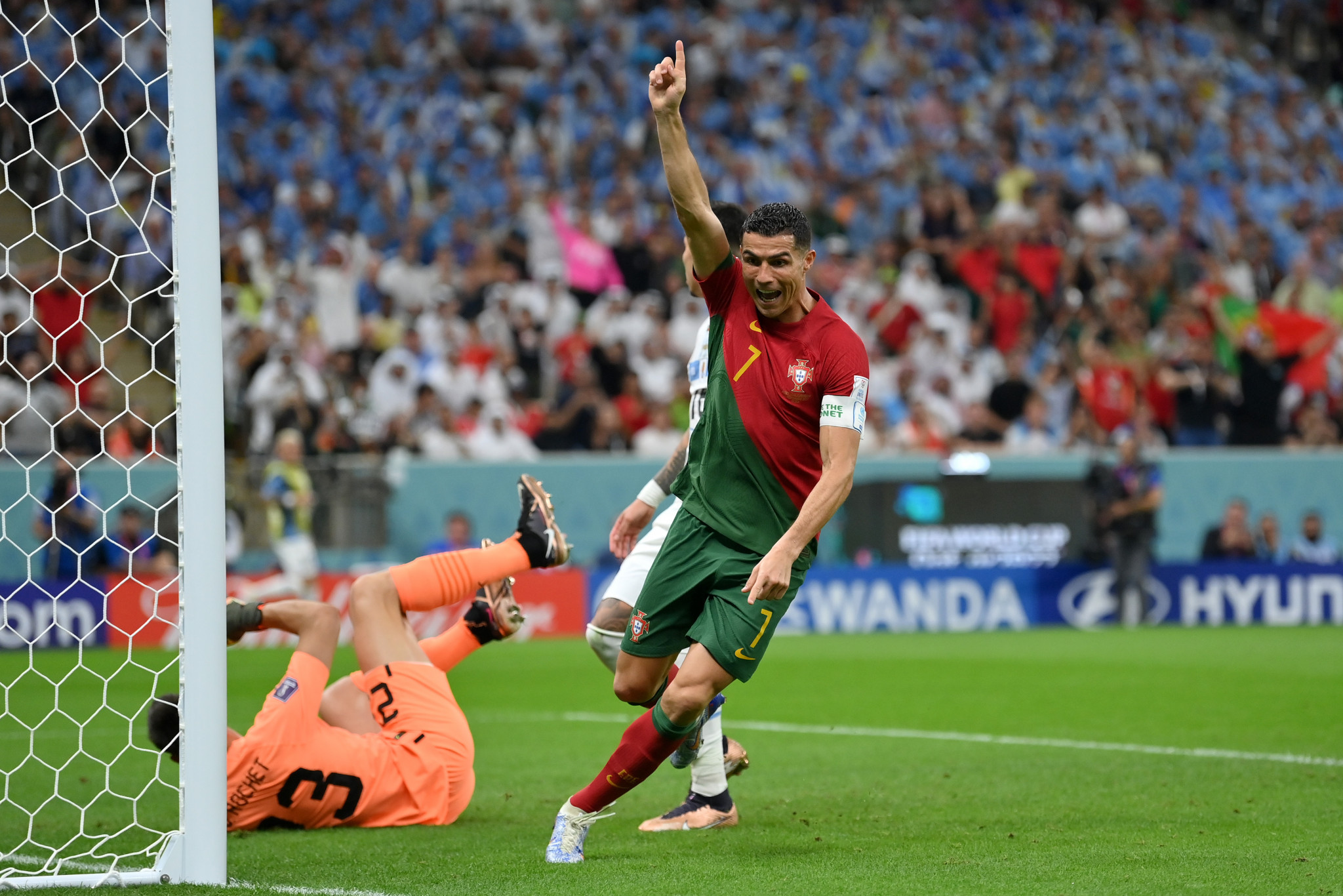 Cristiano Ronaldo celebrates believing he has given Portugal the lead, although Bruno Fernandes cross was ruled to have gone directly into the net ©Getty Images
